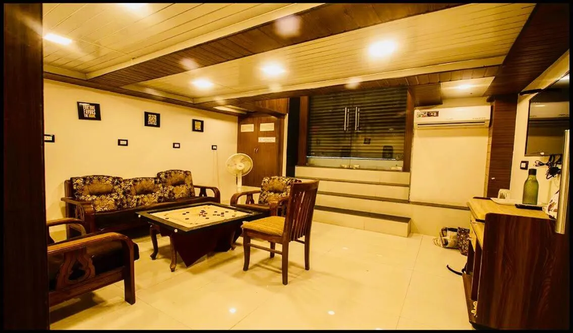 Communal lounge/ TV room in Qubestay Airport Capsule Hotel & Hostel