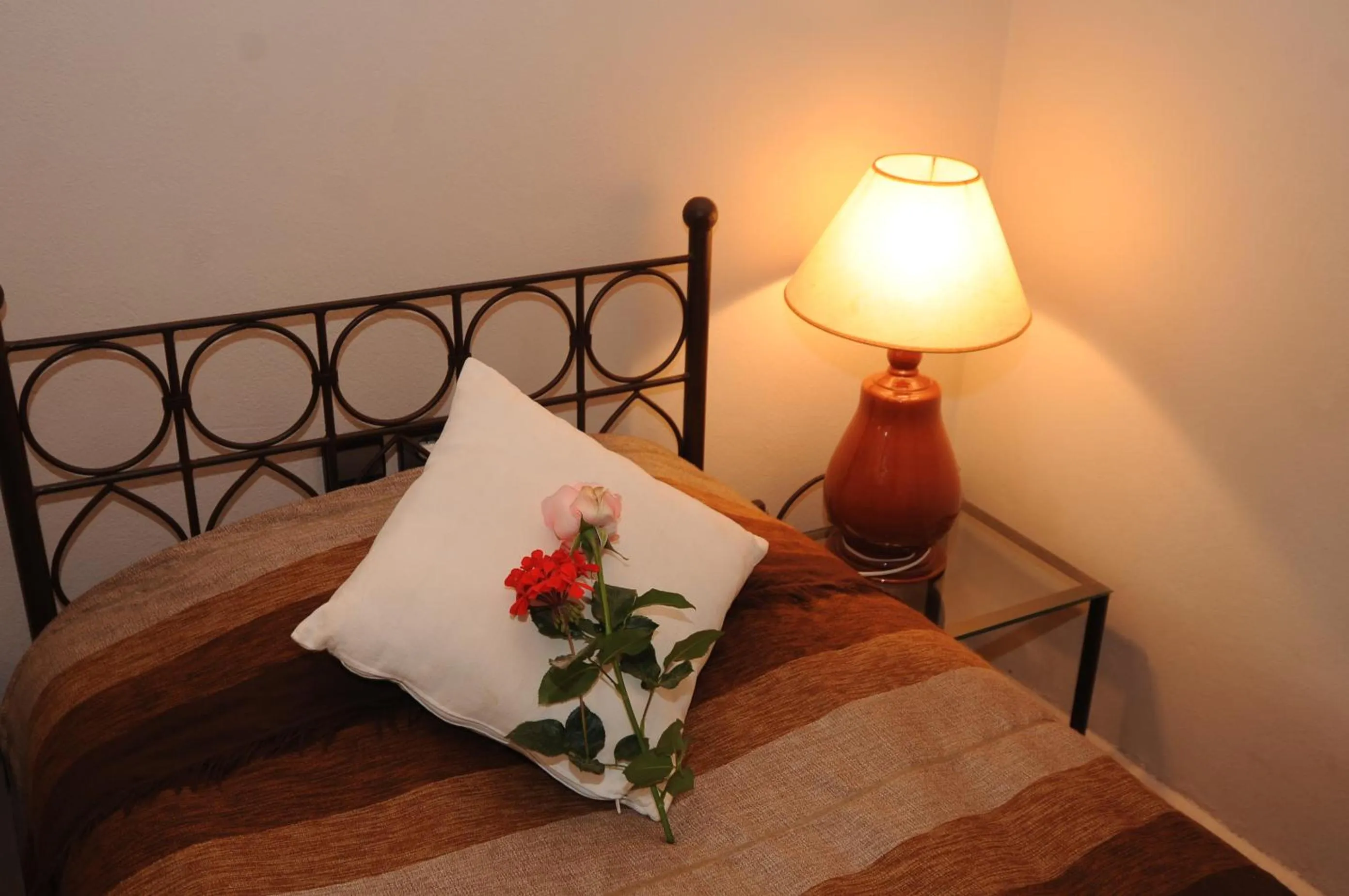 Bed in Auberge Chez Momo II