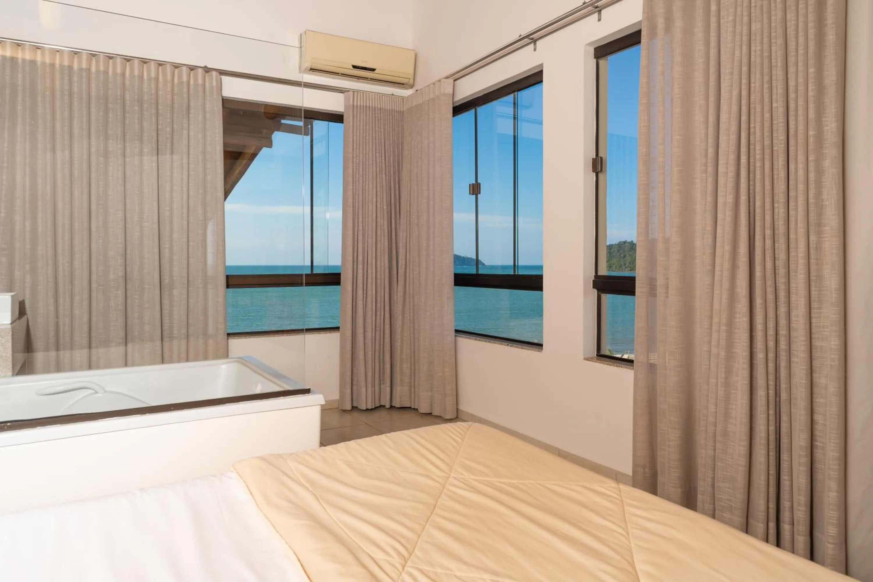 Bed in Pousada Pedra da Ilha