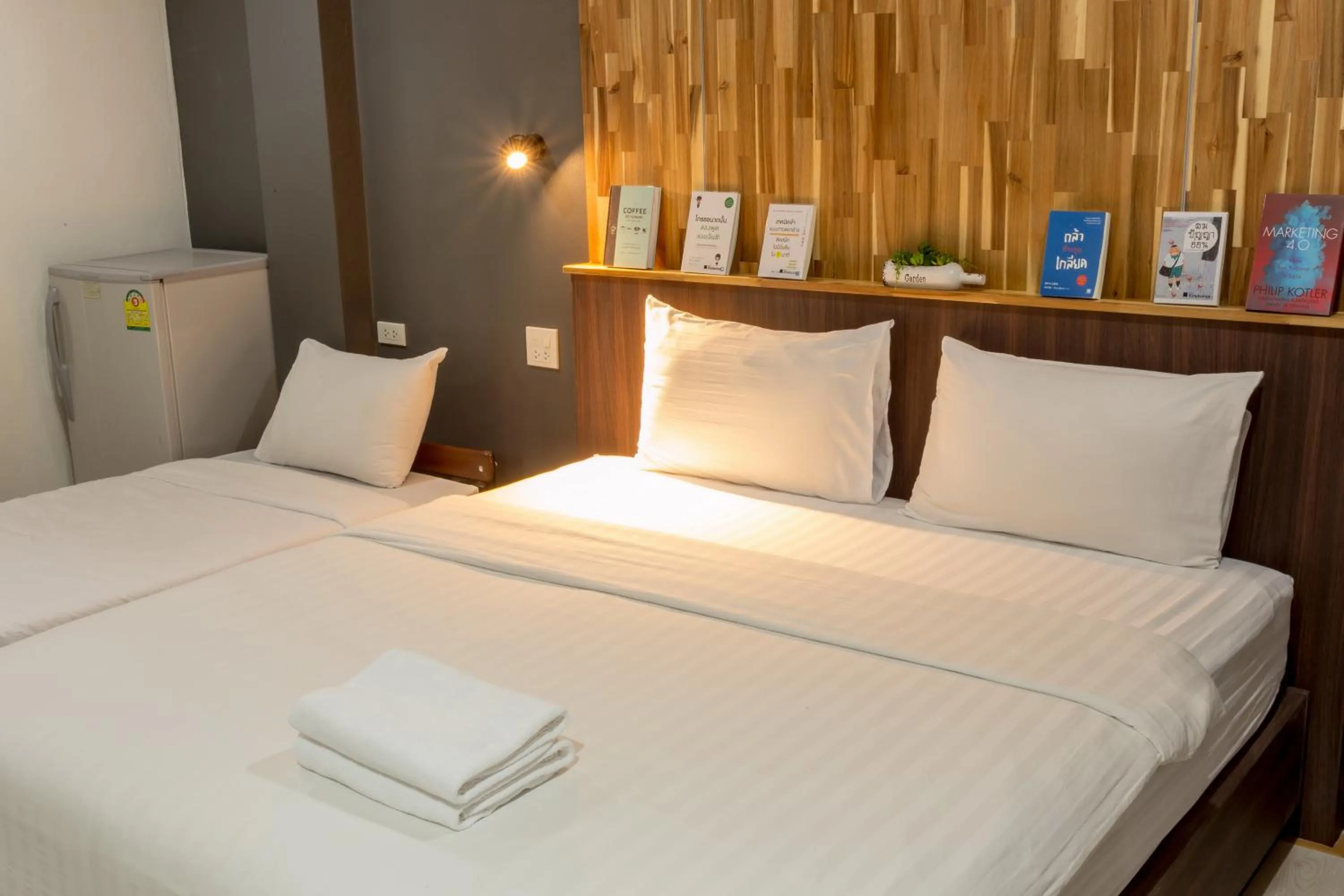 Bed in Phimai Paradise Boutique Hotel