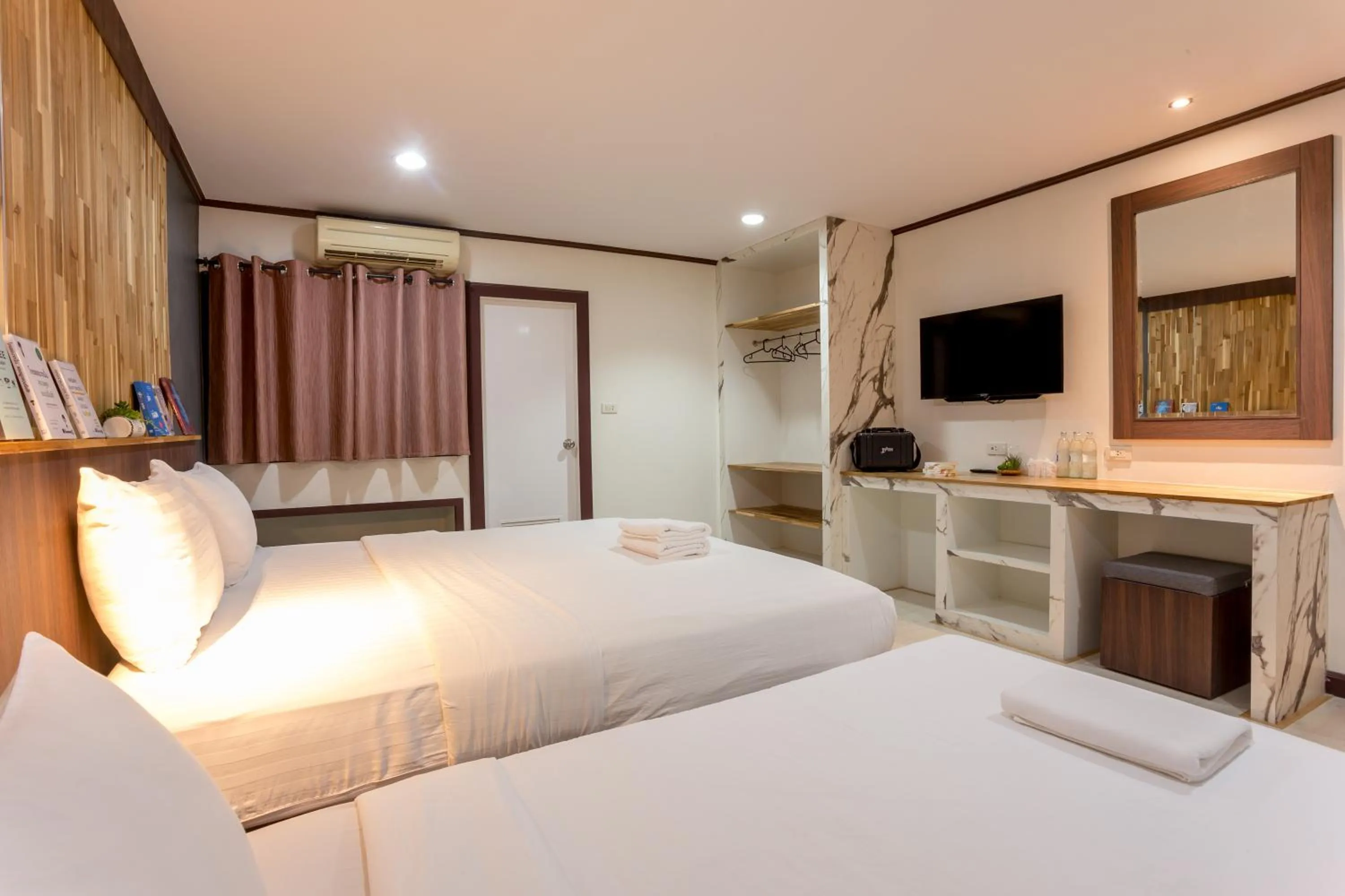 Bed in Phimai Paradise Boutique Hotel