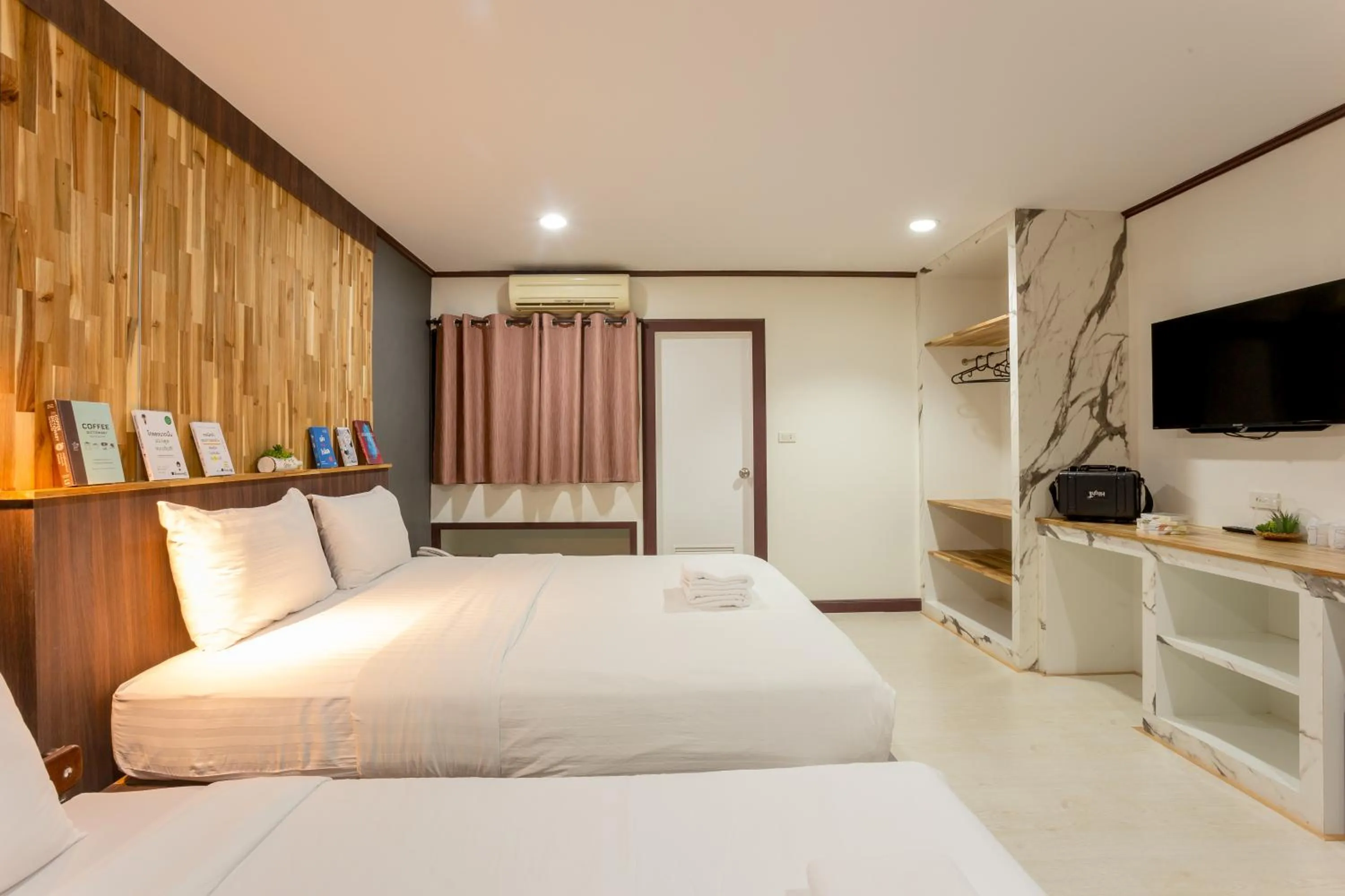 Bed in Phimai Paradise Boutique Hotel