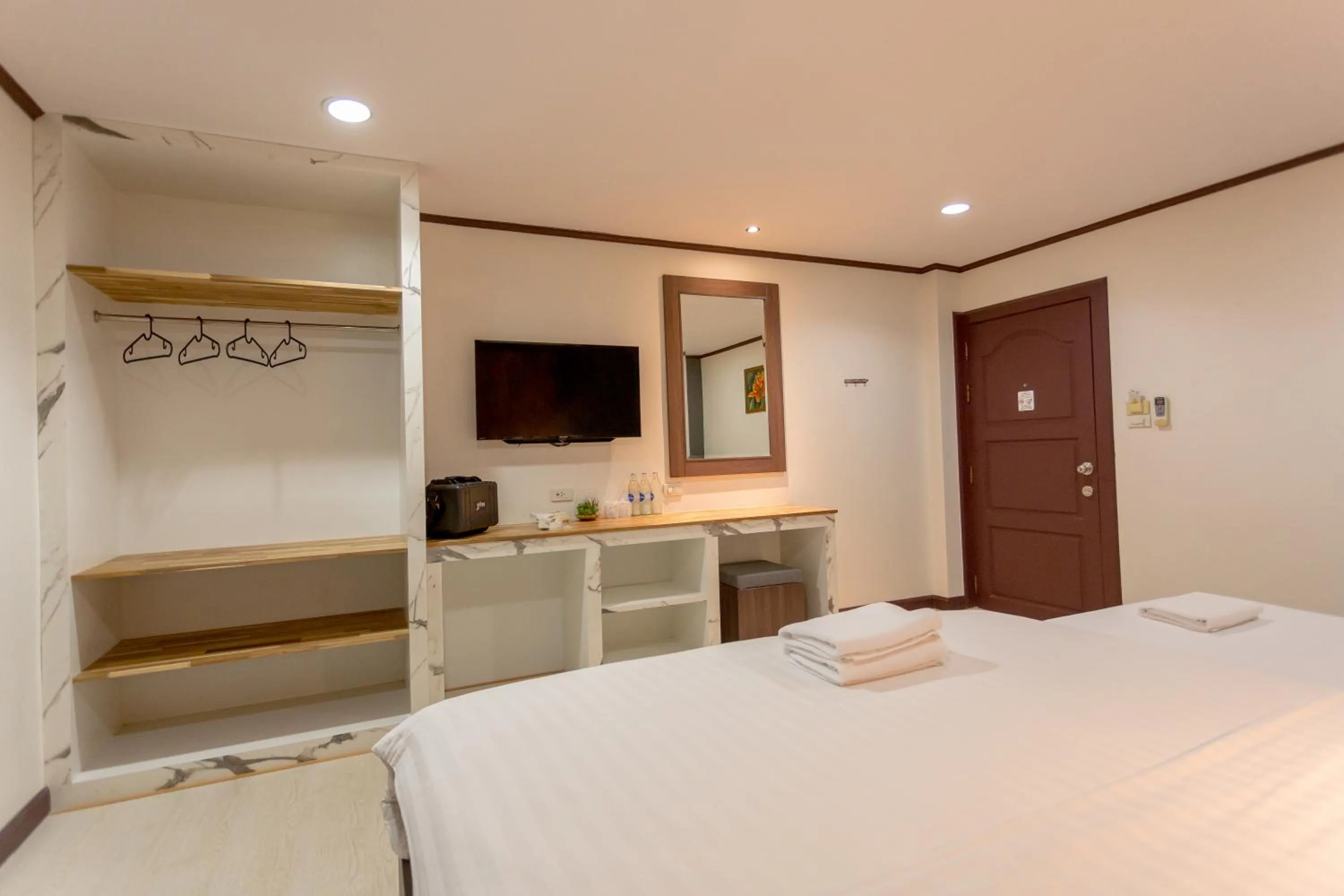 Bed in Phimai Paradise Boutique Hotel