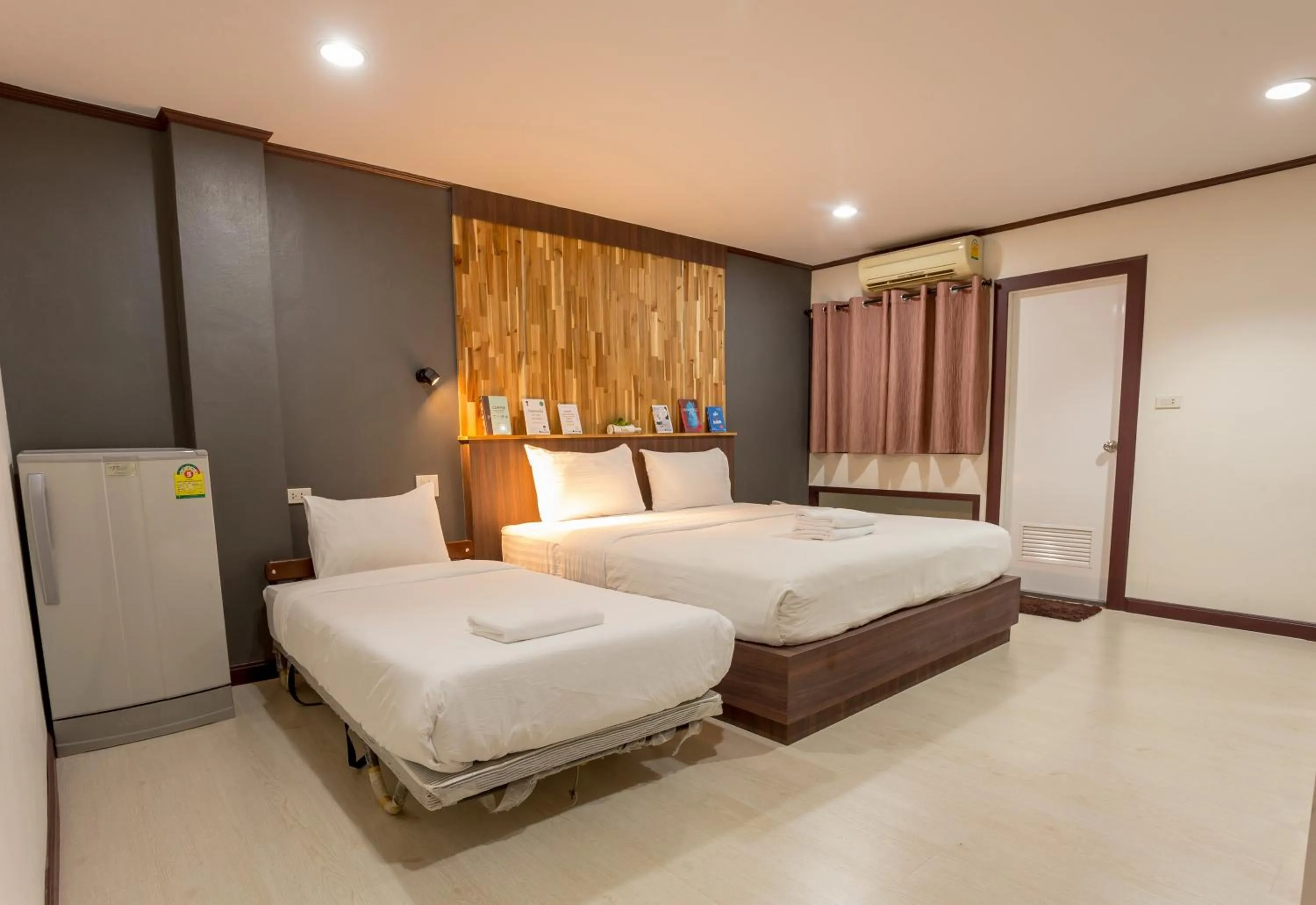 Bed in Phimai Paradise Boutique Hotel