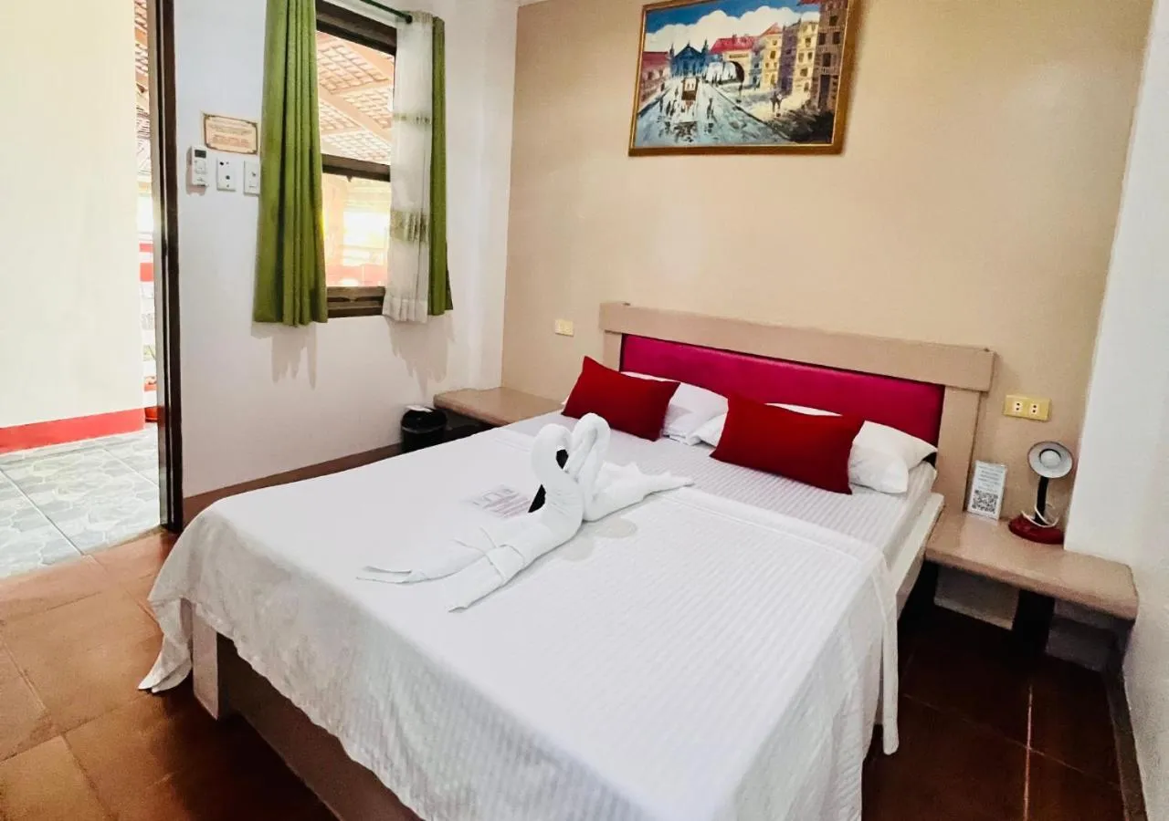 Bedroom, Bed in Badladz Beach and Dive Resort