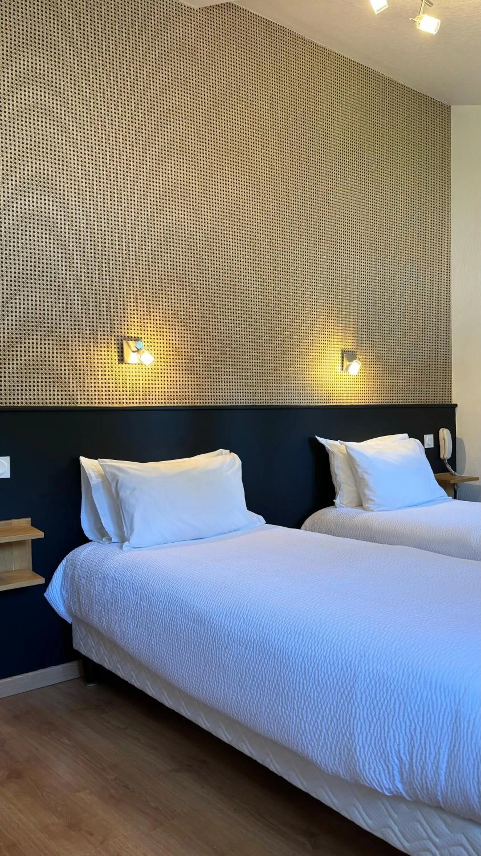 Bedroom, Bed in Logis Hôtel Restaurant Grand Hôtel de Lyon