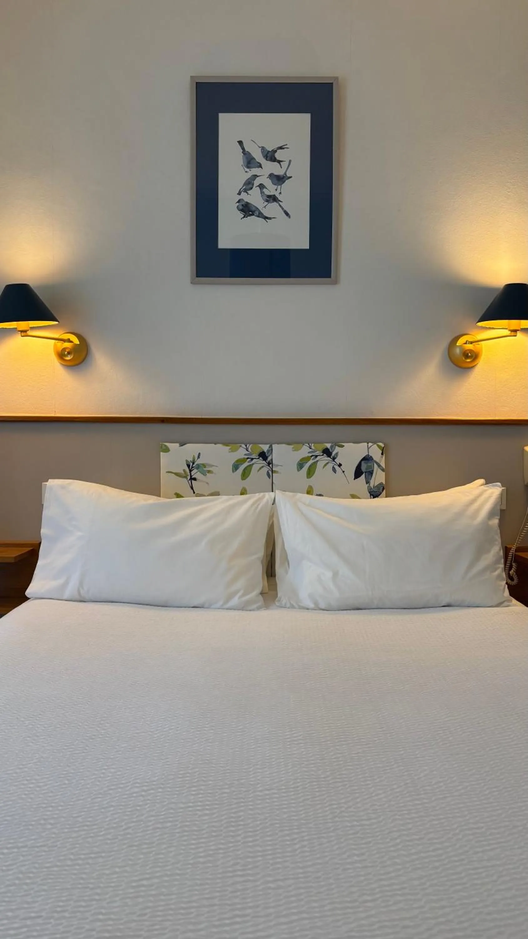 Bed in Logis Hôtel Restaurant Grand Hôtel de Lyon