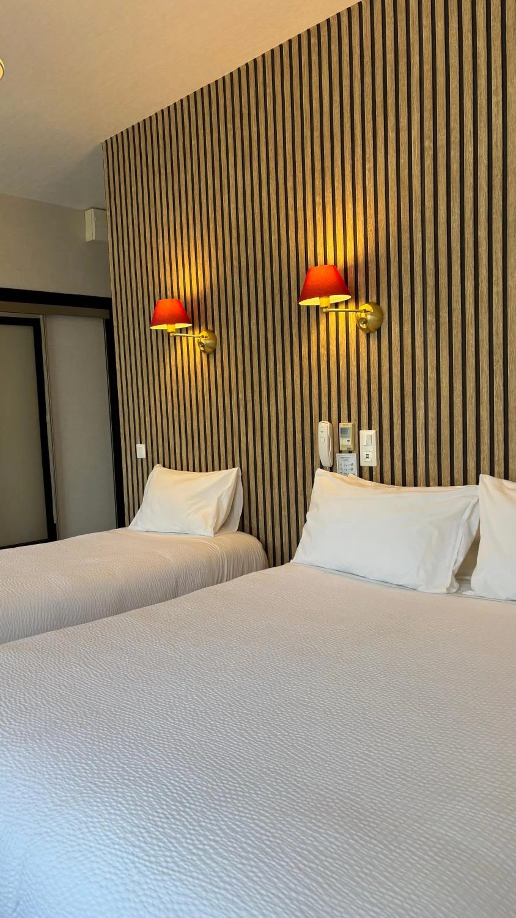 Bed in Logis Hôtel Restaurant Grand Hôtel de Lyon