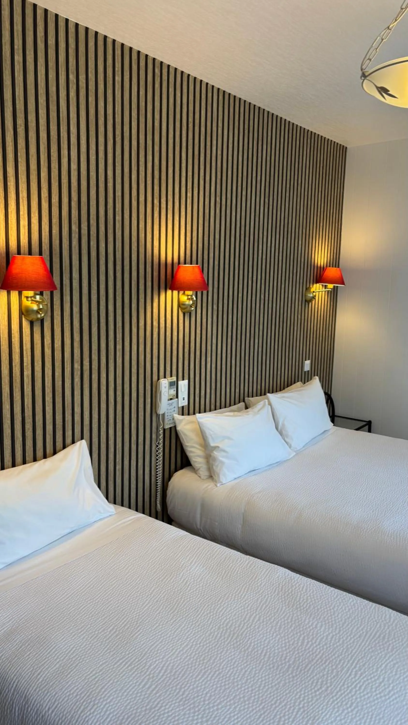 Bed in Logis Hôtel Restaurant Grand Hôtel de Lyon