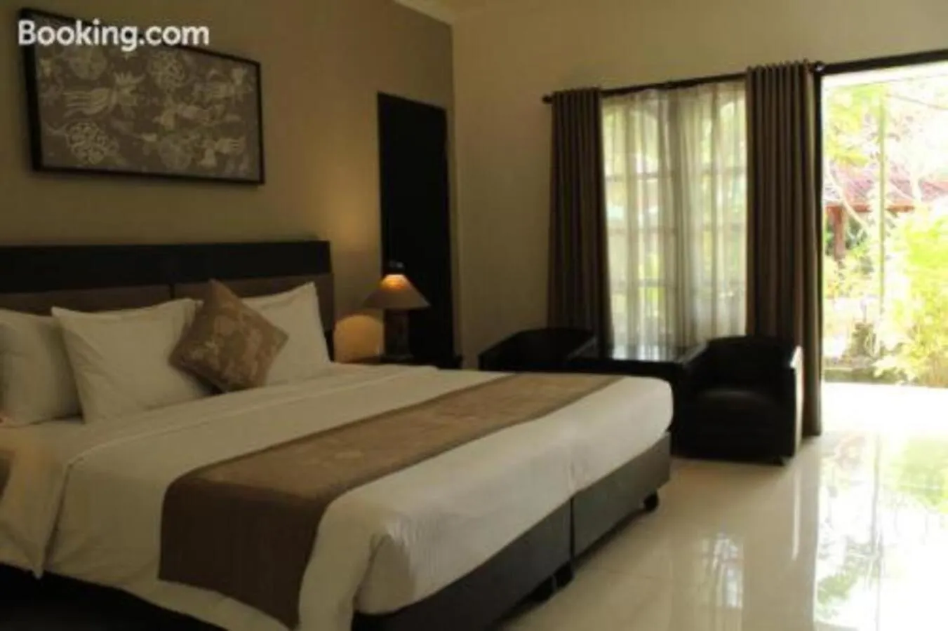 Bed in Sarinande Hotel