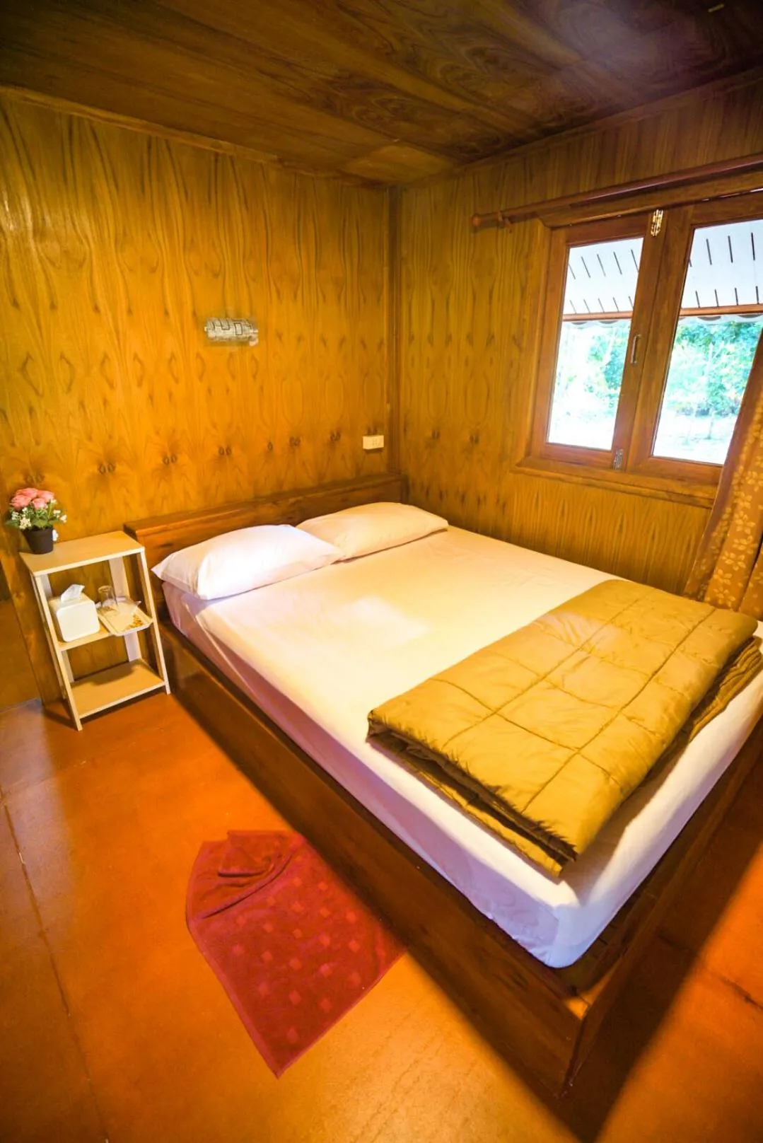 Bed in Taluangjit Resort&Garden