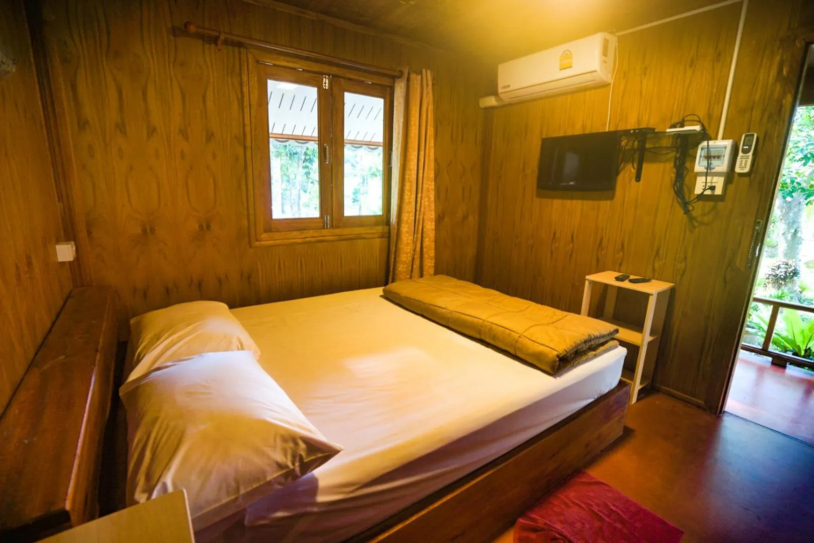 Bed in Taluangjit Resort&Garden