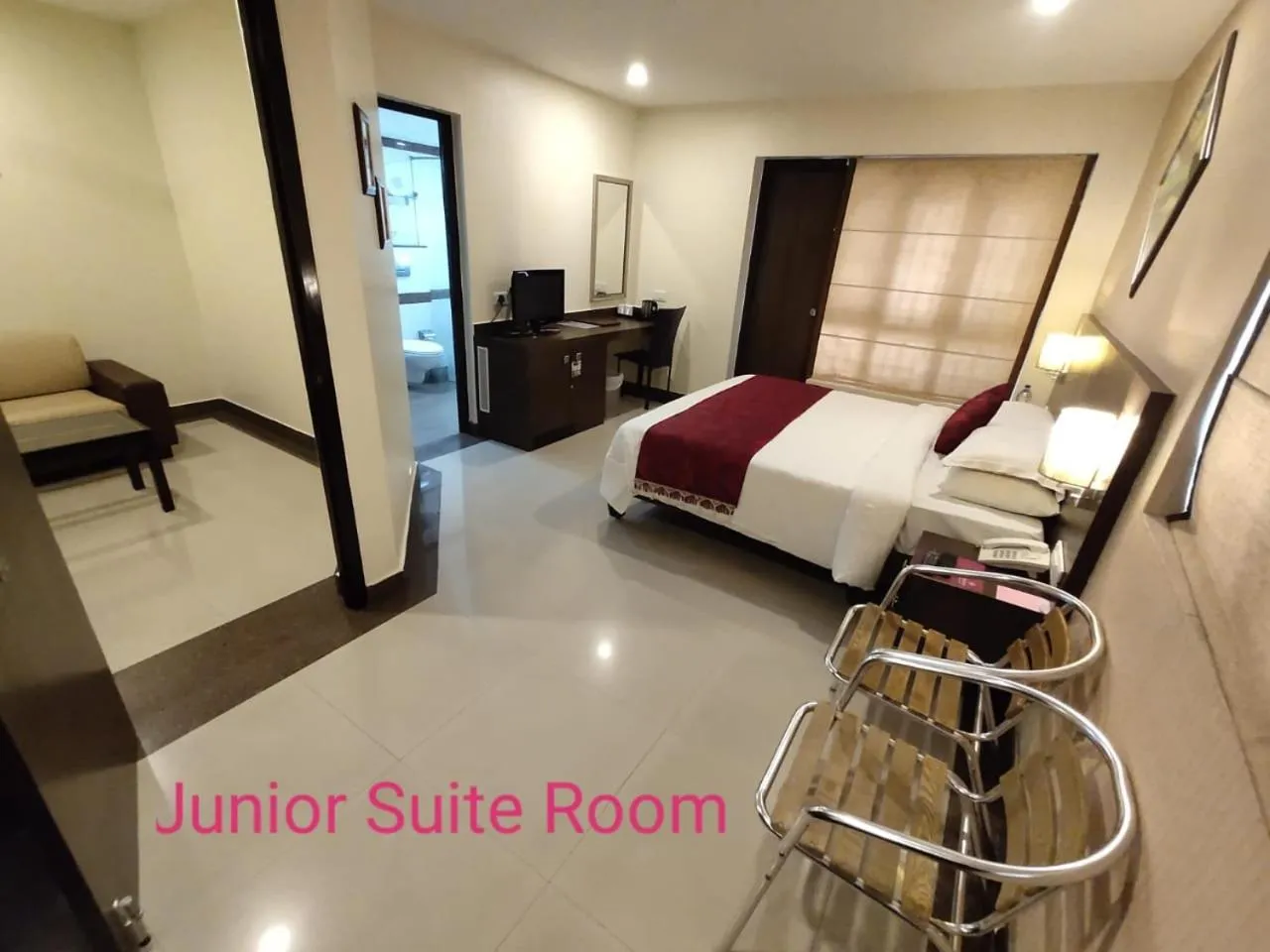 Photo of the whole room, Bed in Arpanaa Hotel