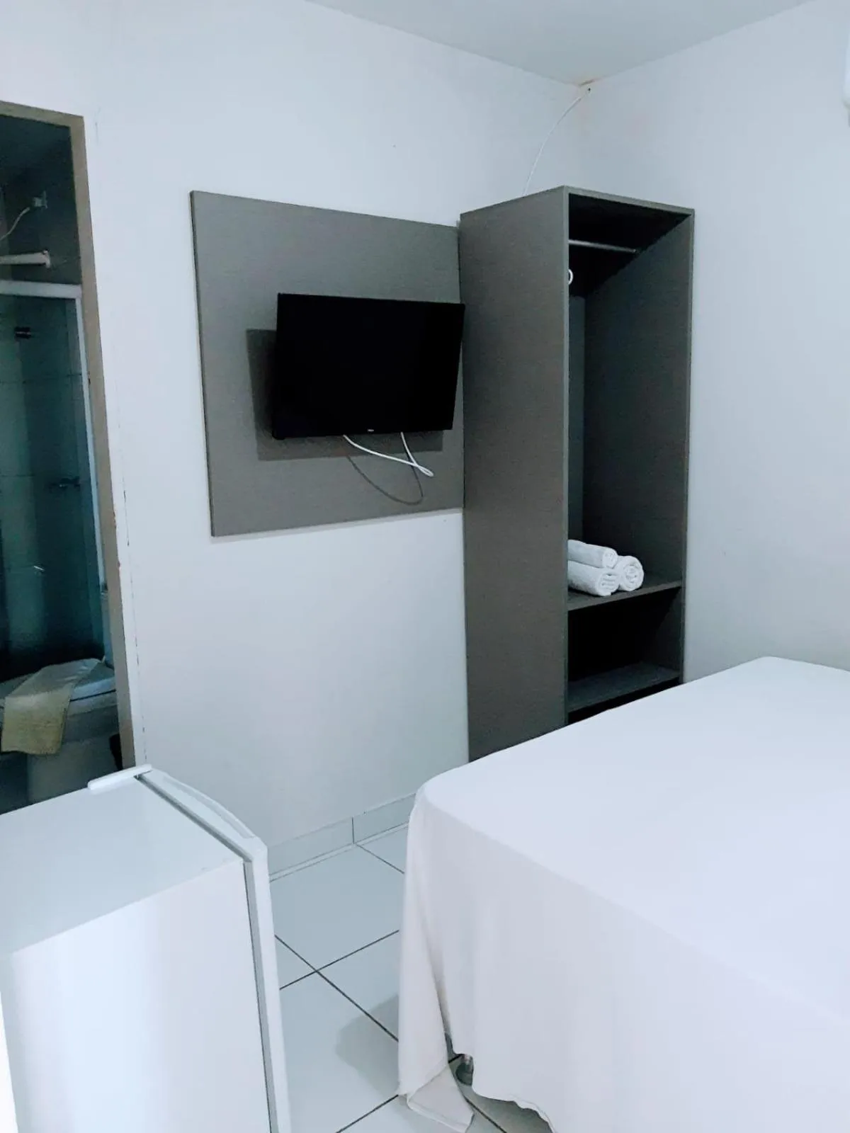 Bed in Pousada Tambaú