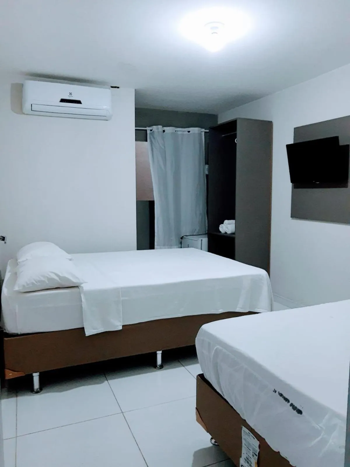 Bed in Pousada Tambaú