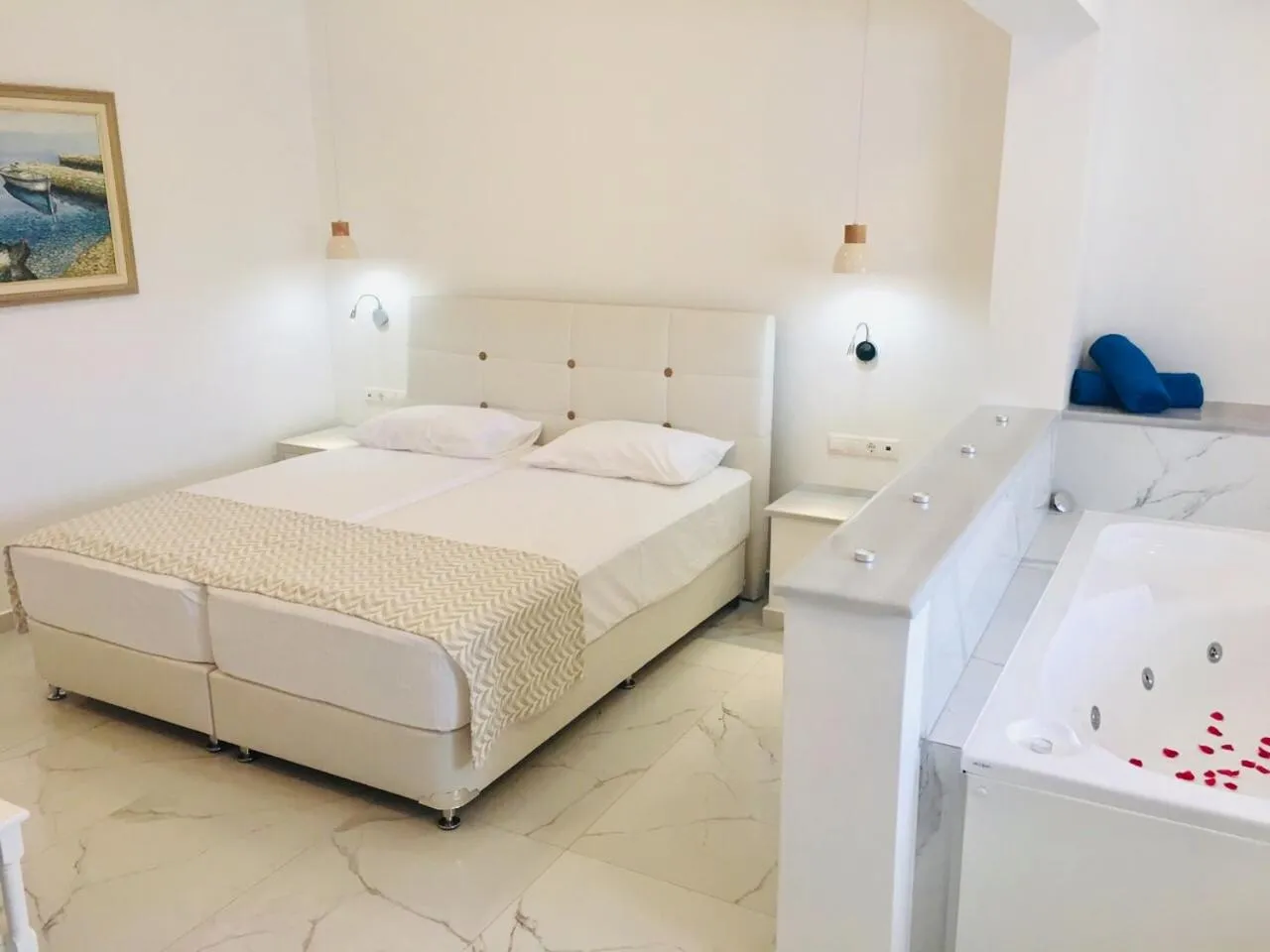 Bed in Limnionas Bay Village Hotel