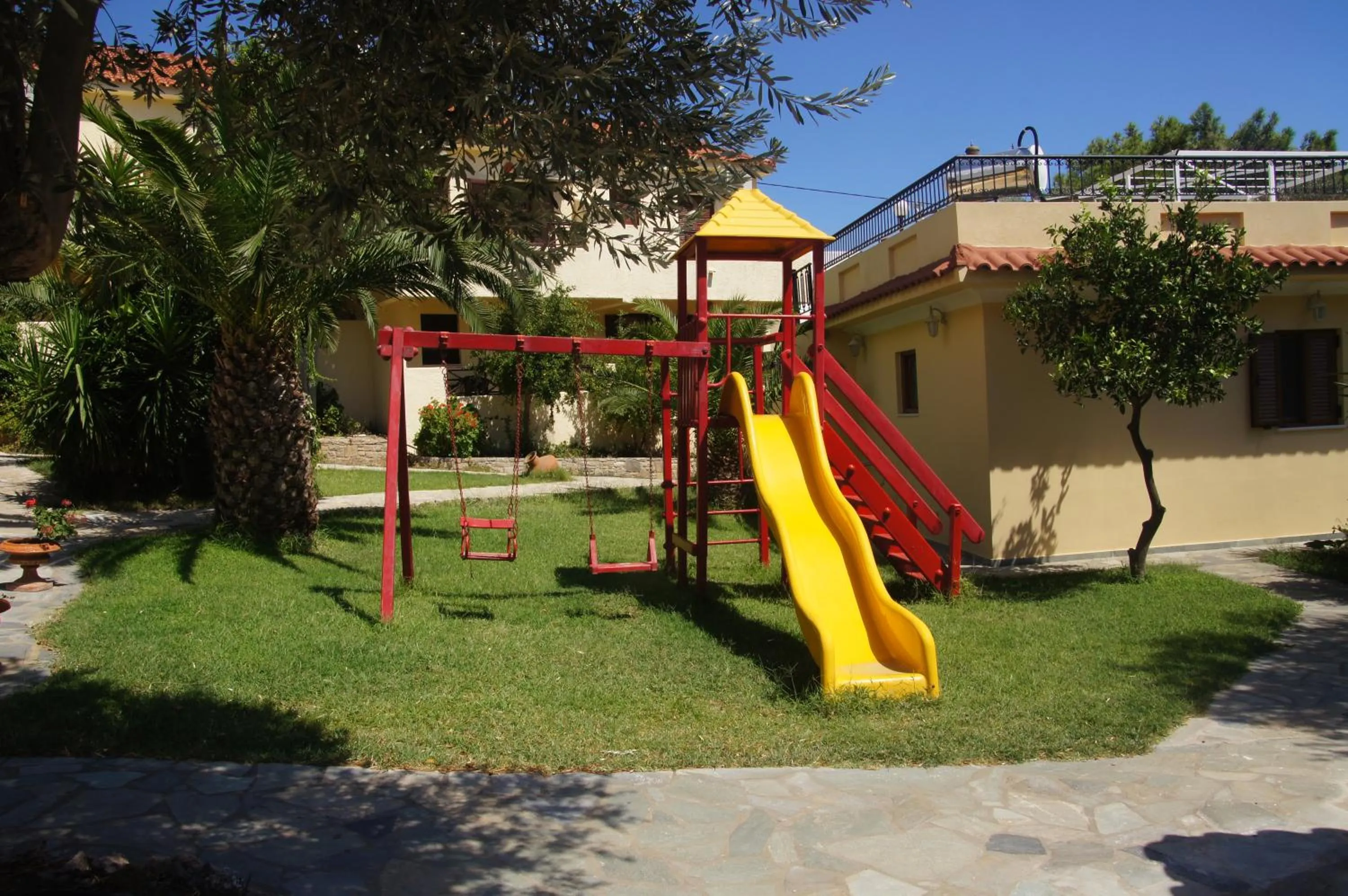 Children play ground in Limnionas Bay Village Hotel