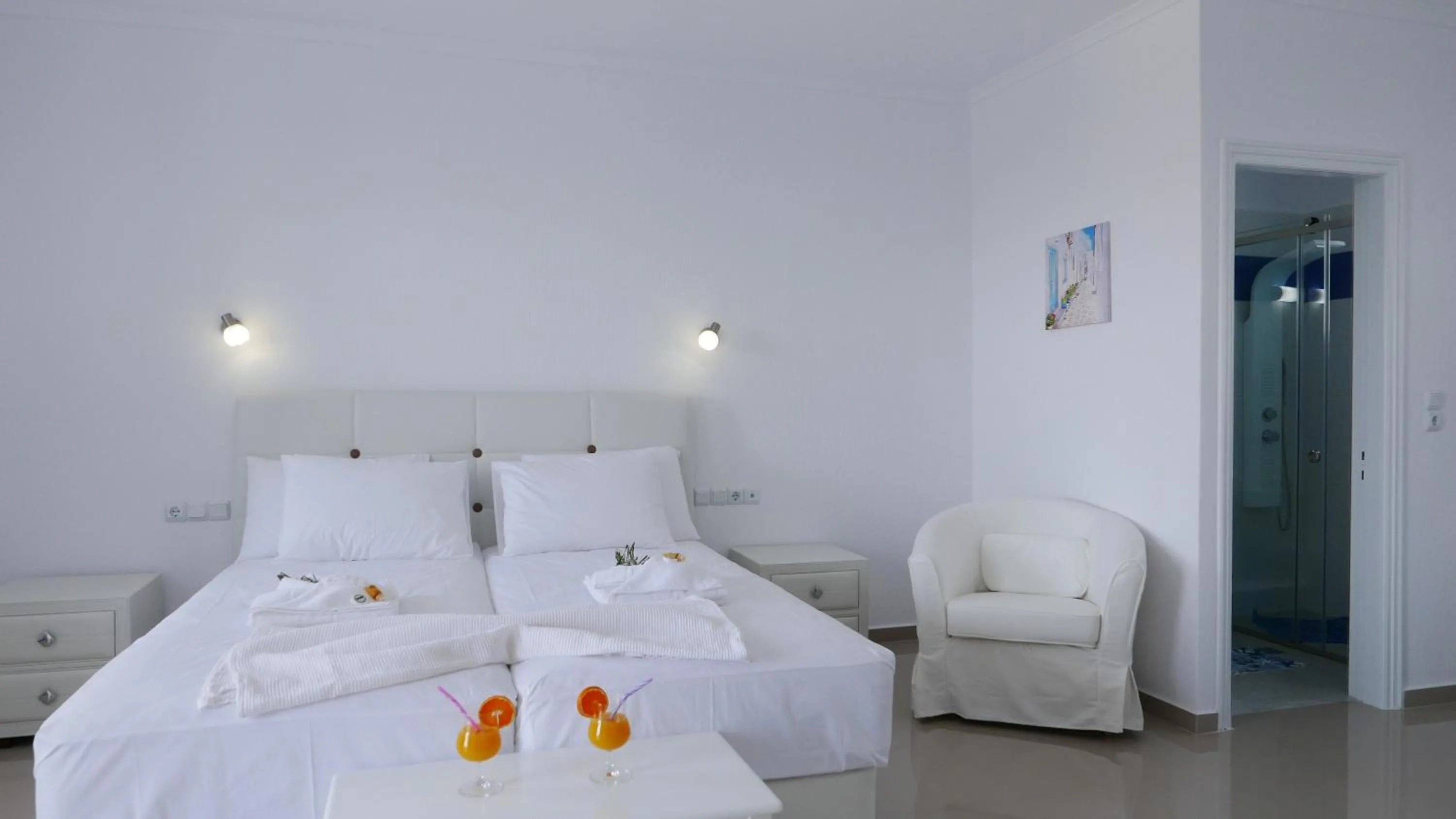 Bed in Limnionas Bay Village Hotel