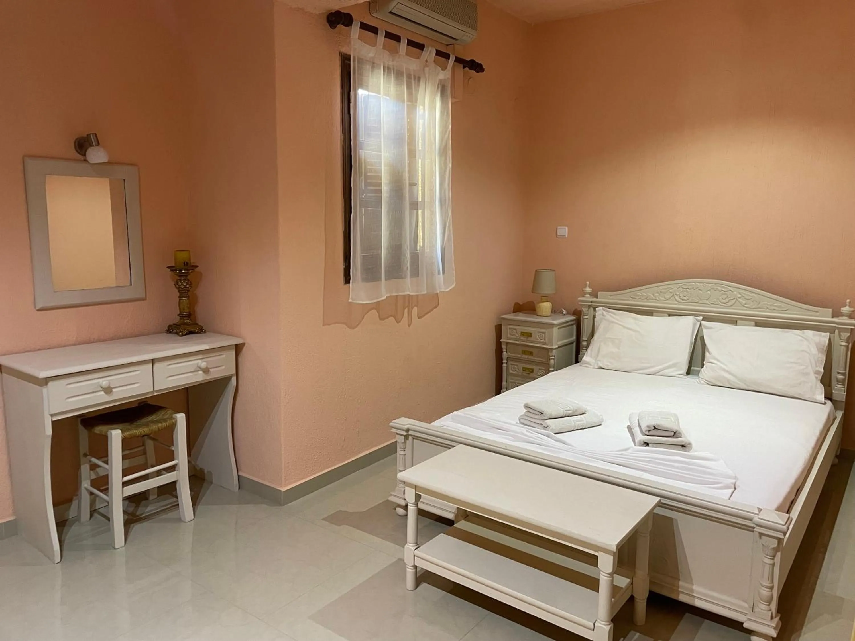 Bed in Limnionas Bay Village Hotel