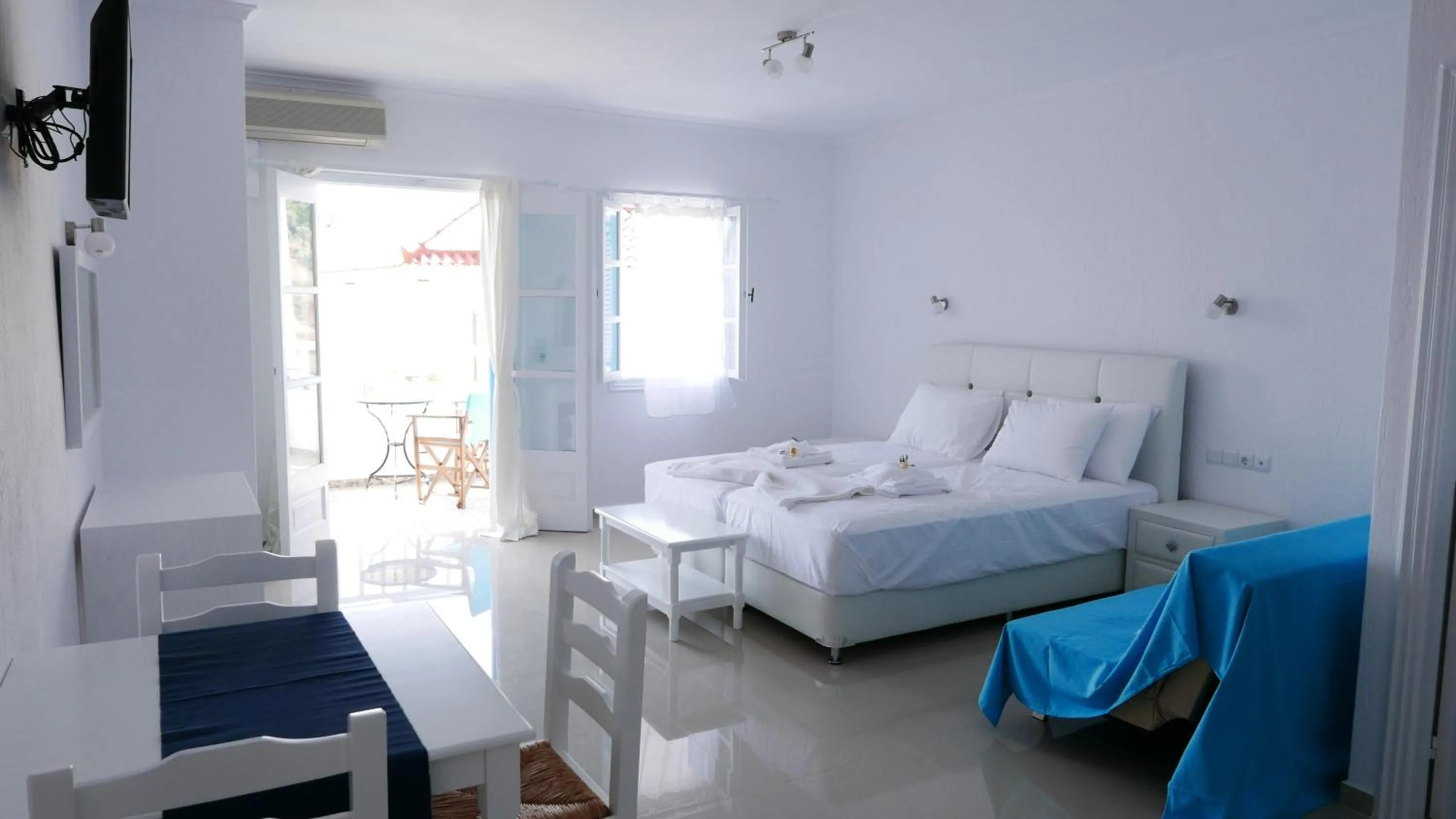 Bed in Limnionas Bay Village Hotel