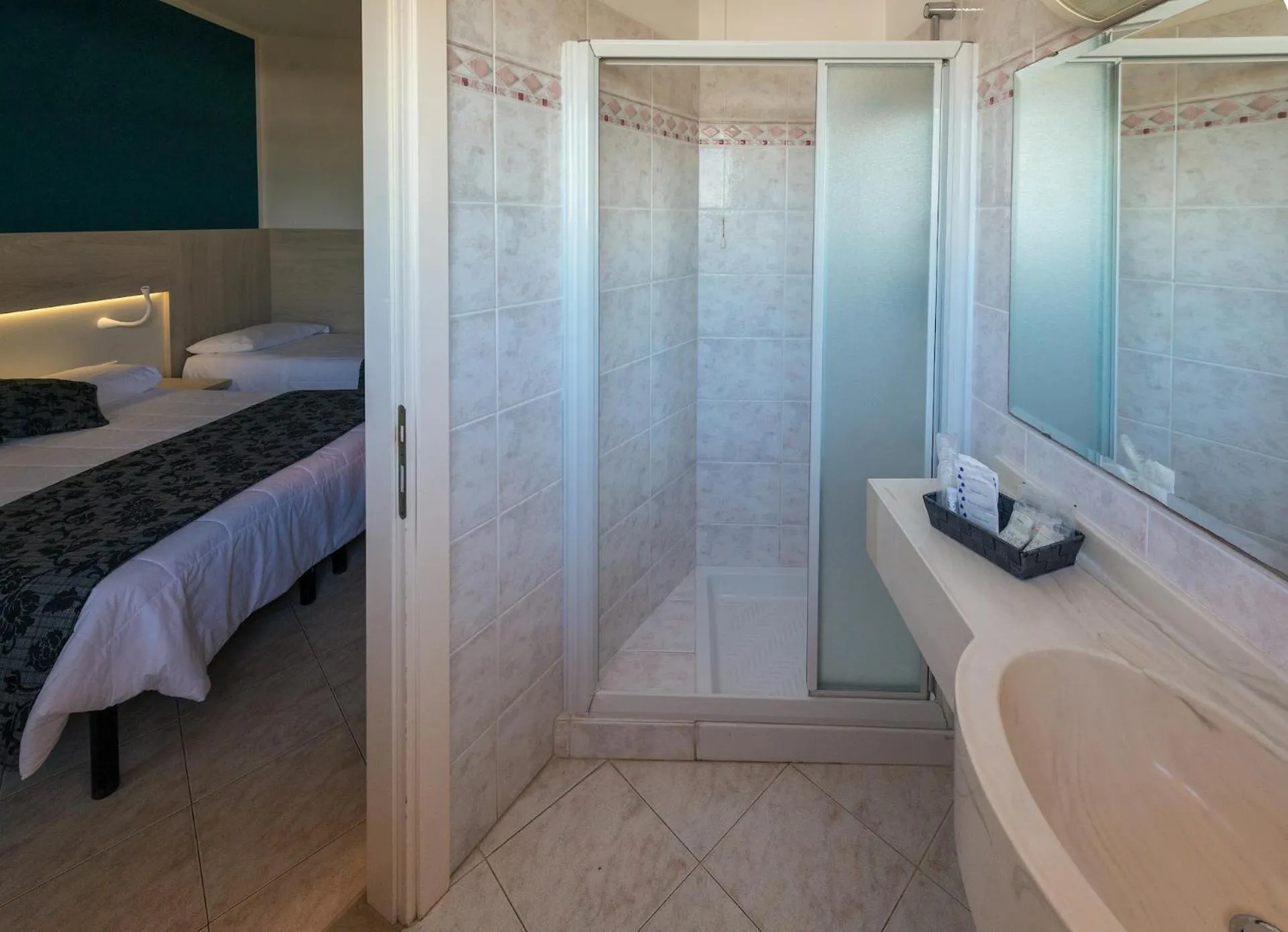 Bed in Hotel il Delfino