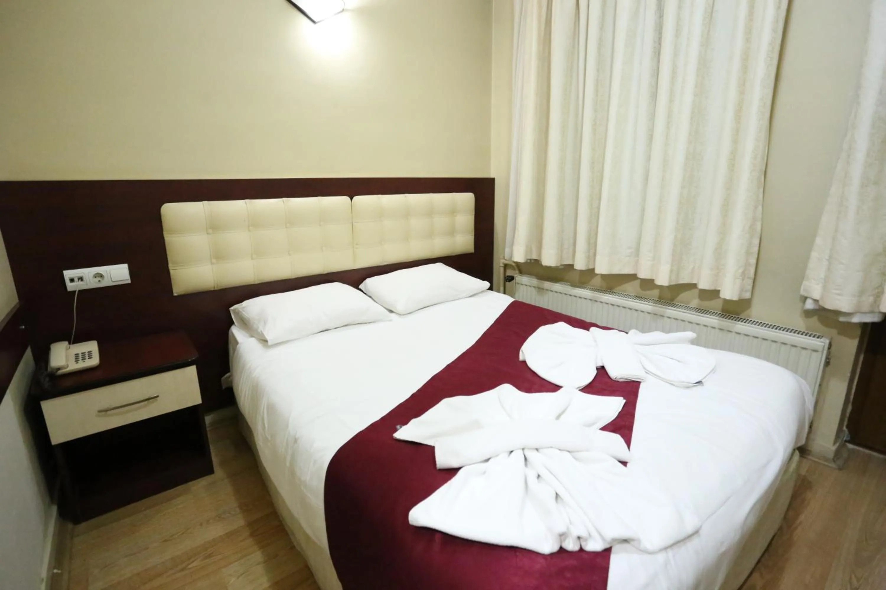 Bed in Sena Hotels