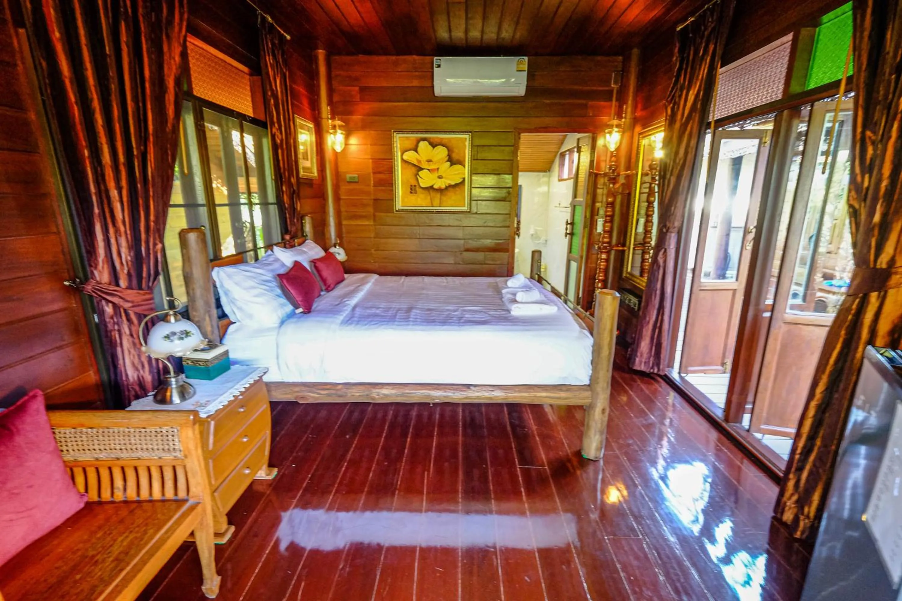 Bed in Rommai Villa Chiang Rai