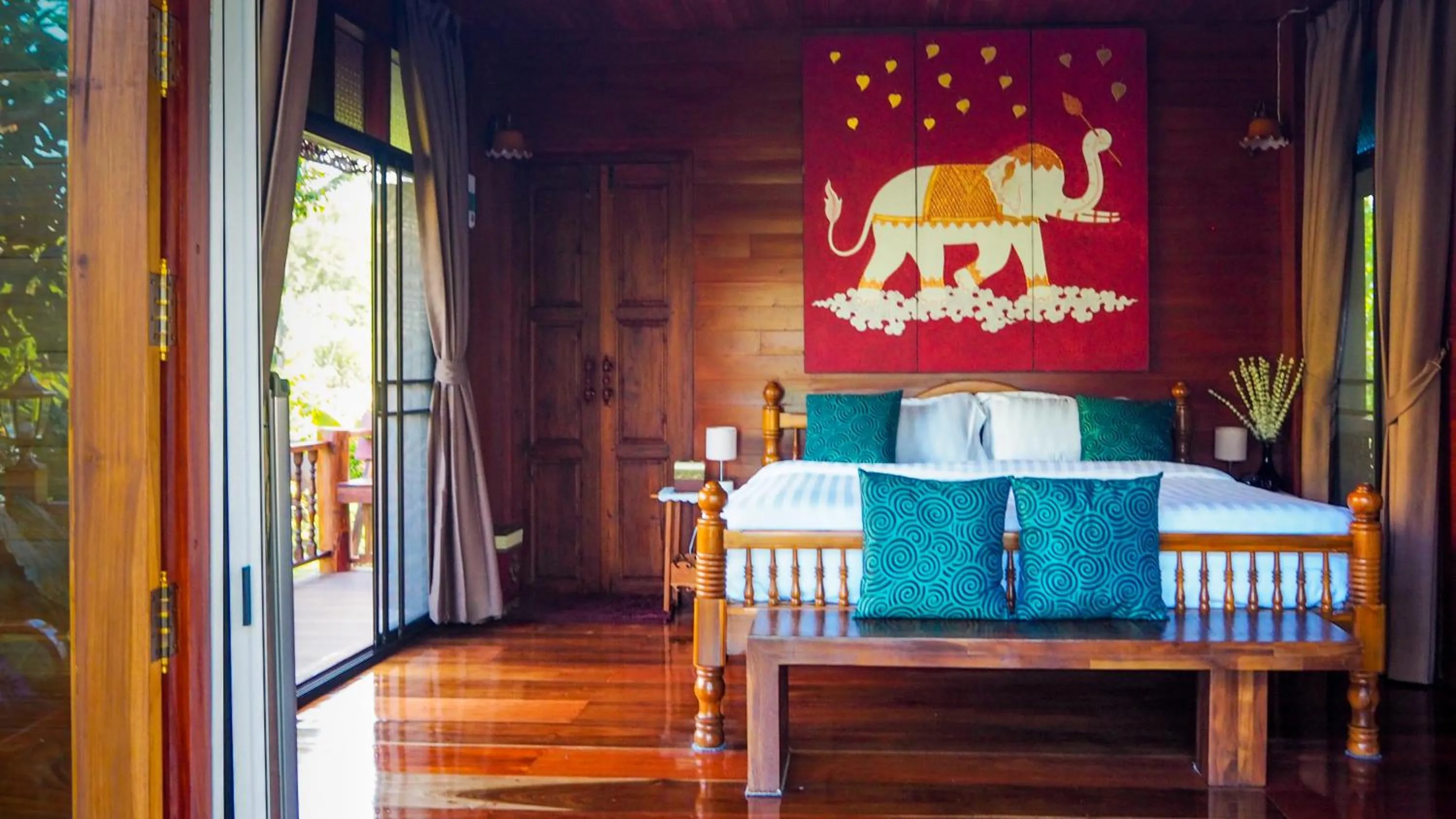 Bed in Rommai Villa Chiang Rai