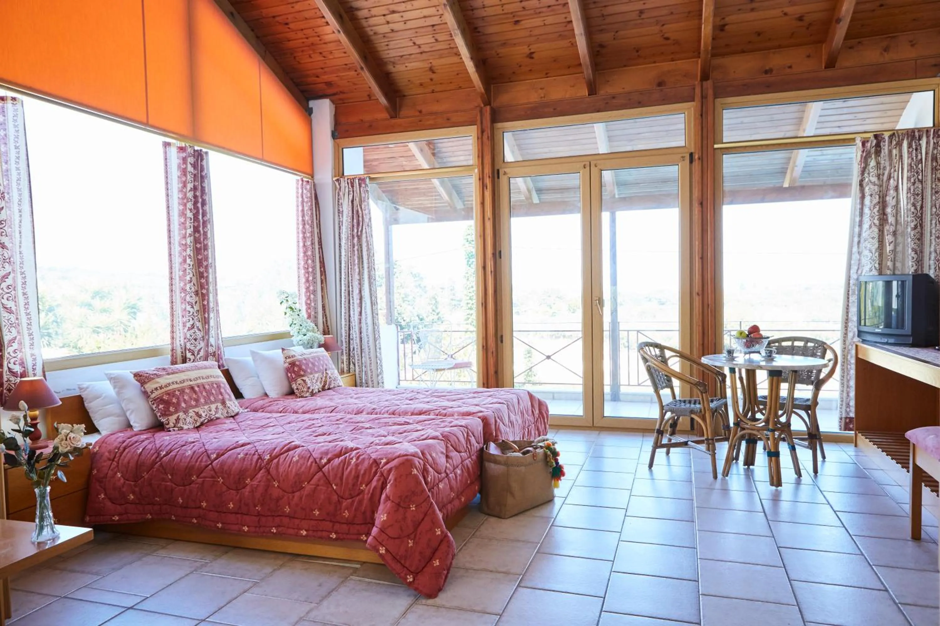 Bed in Vamos Palace Apartments