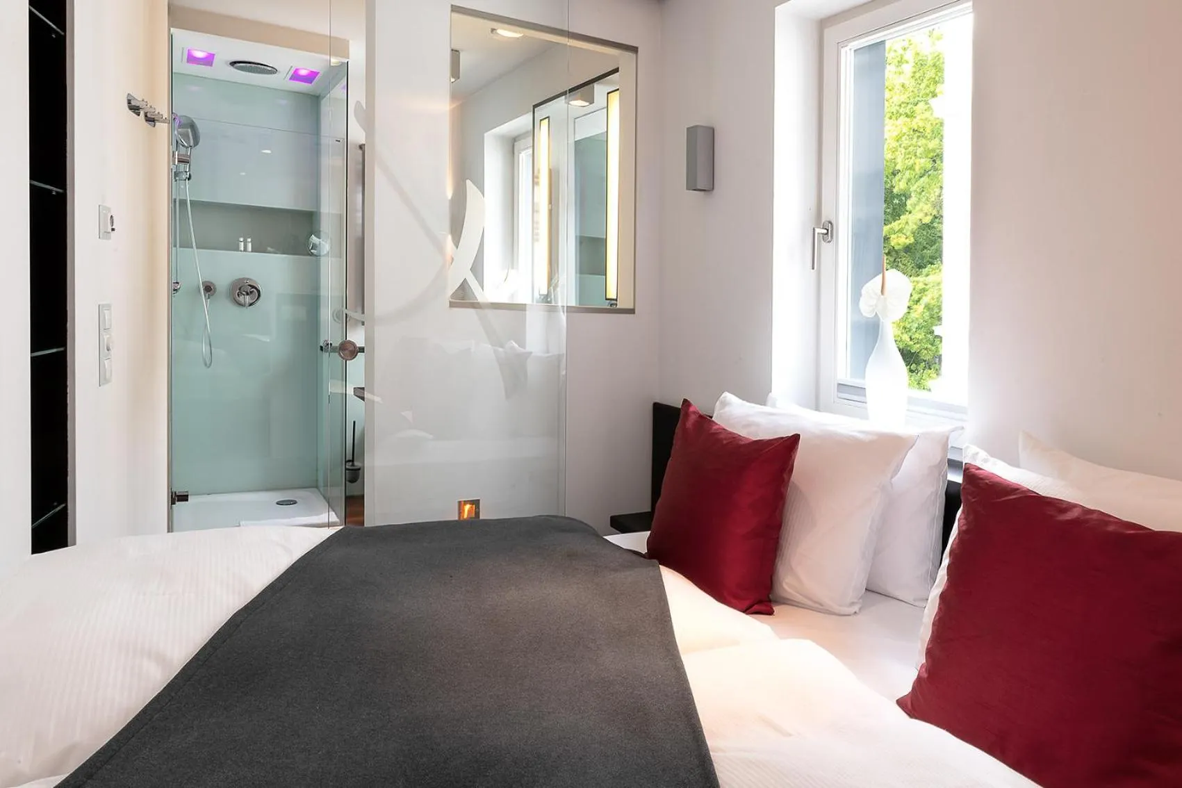 Bed in niXe Boutiquehotel & Spa