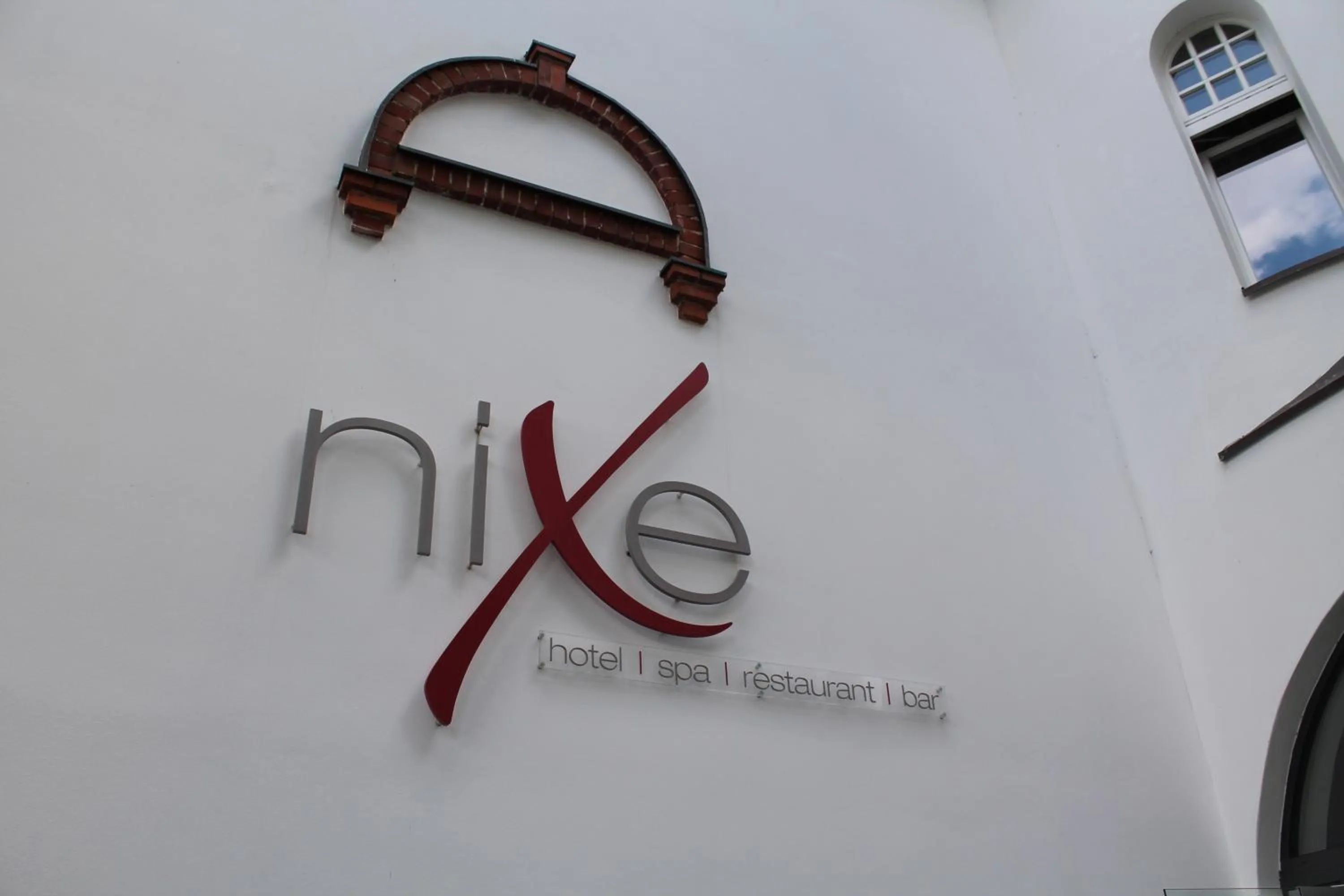 Property logo or sign in niXe Boutiquehotel & Spa
