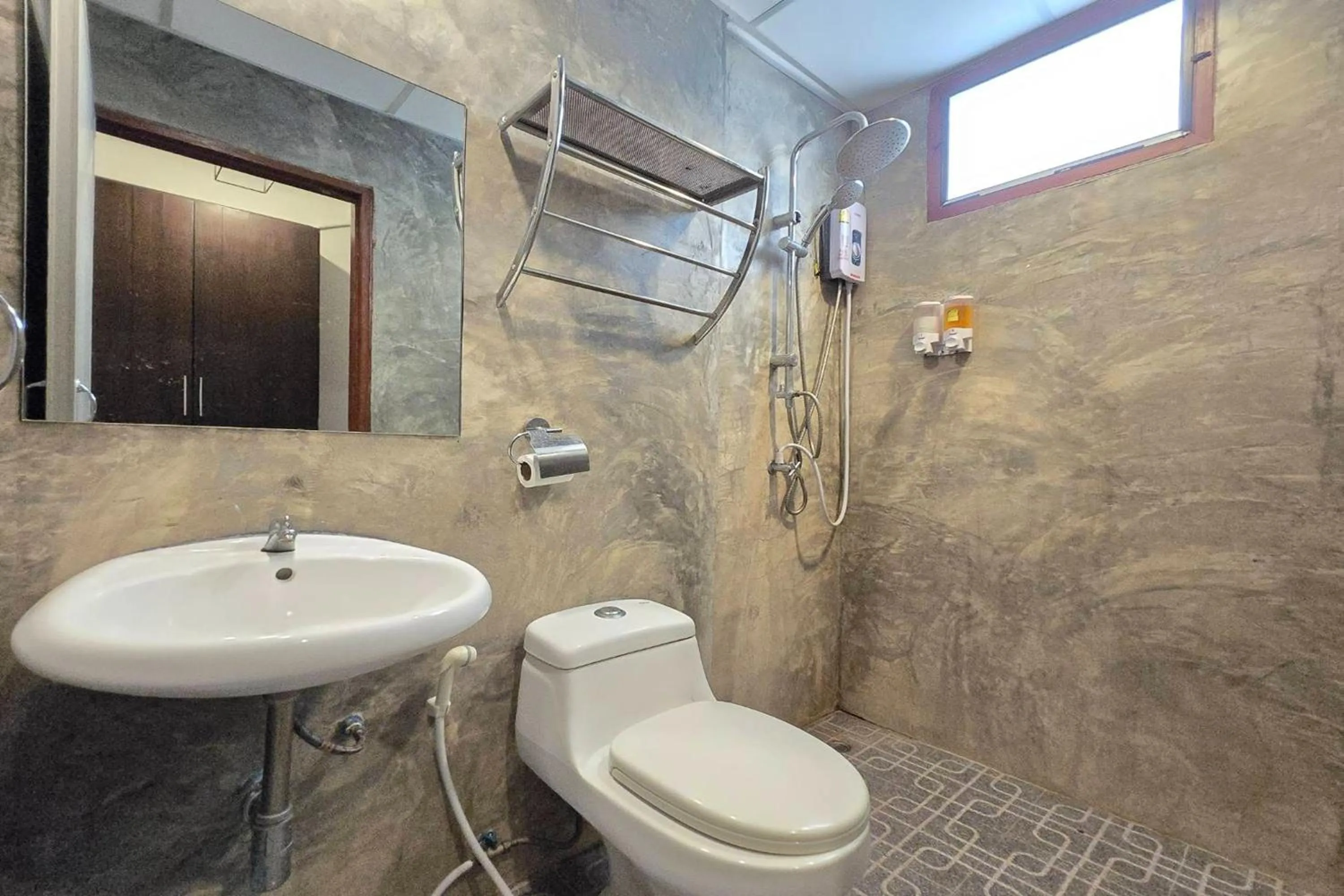 Shower in Hotel Wualai by CMStay