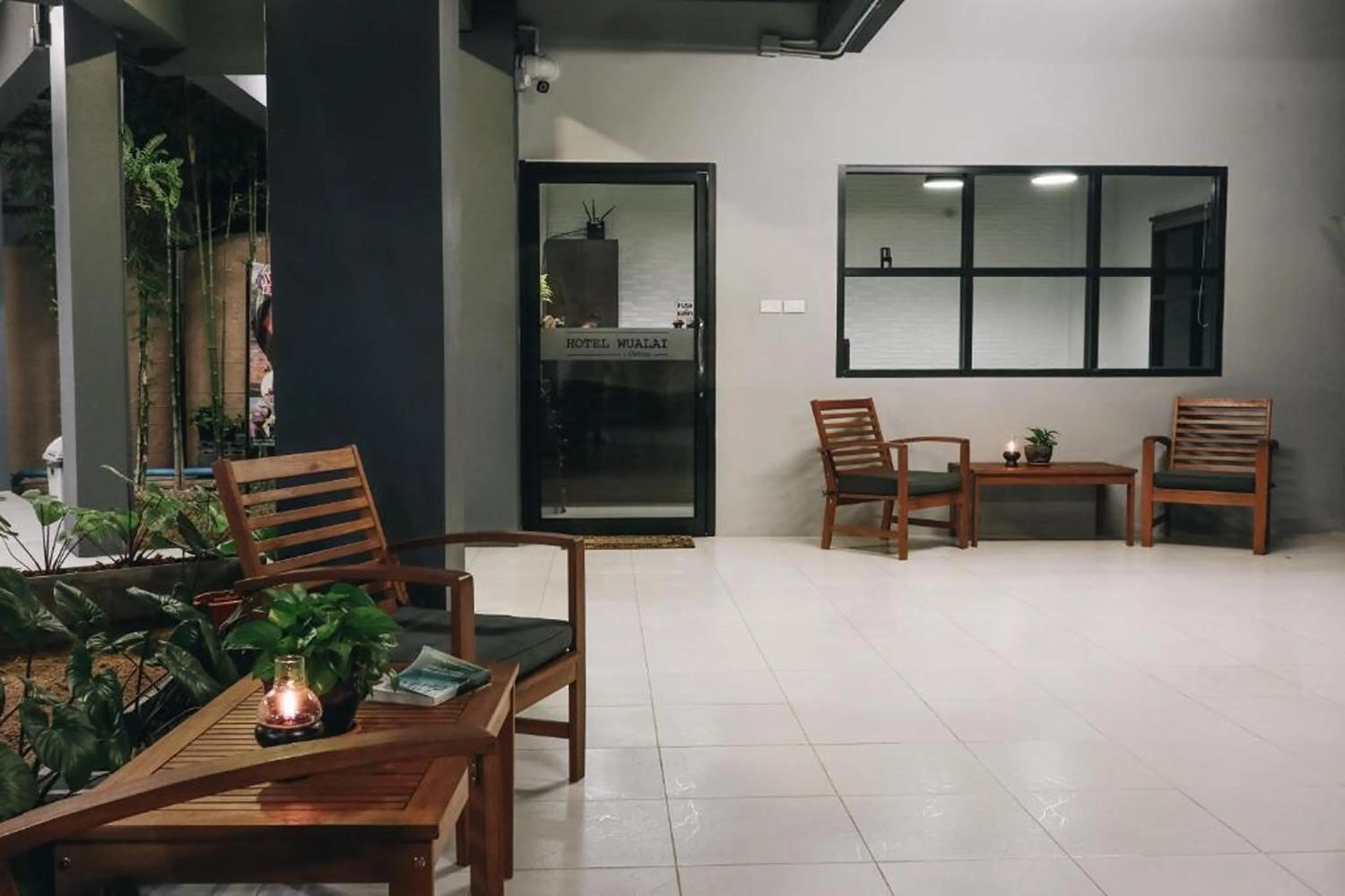 Seating area in Hotel Wualai by CMStay