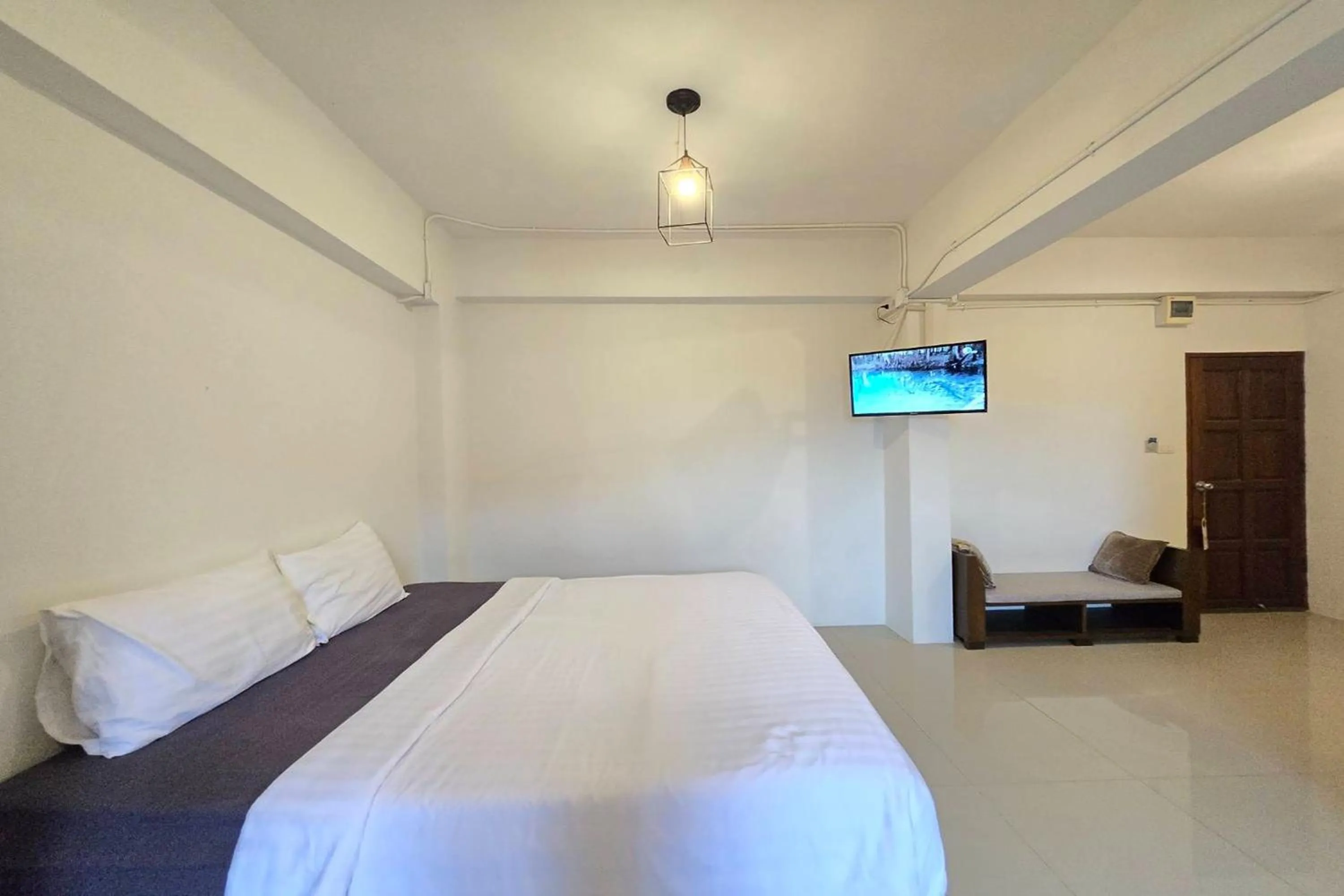 Bed in Hotel Wualai by CMStay