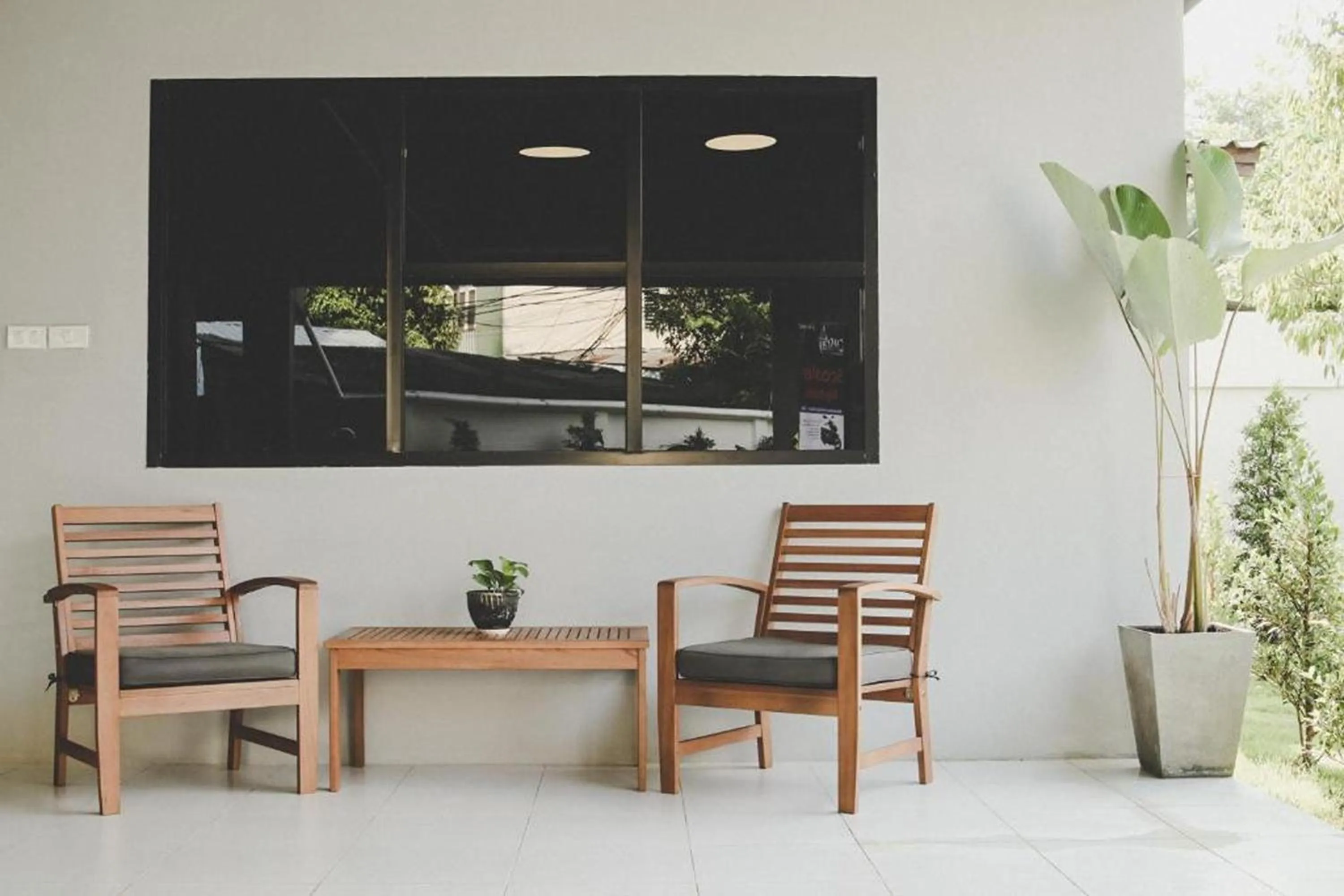 Seating area in Hotel Wualai by CMStay