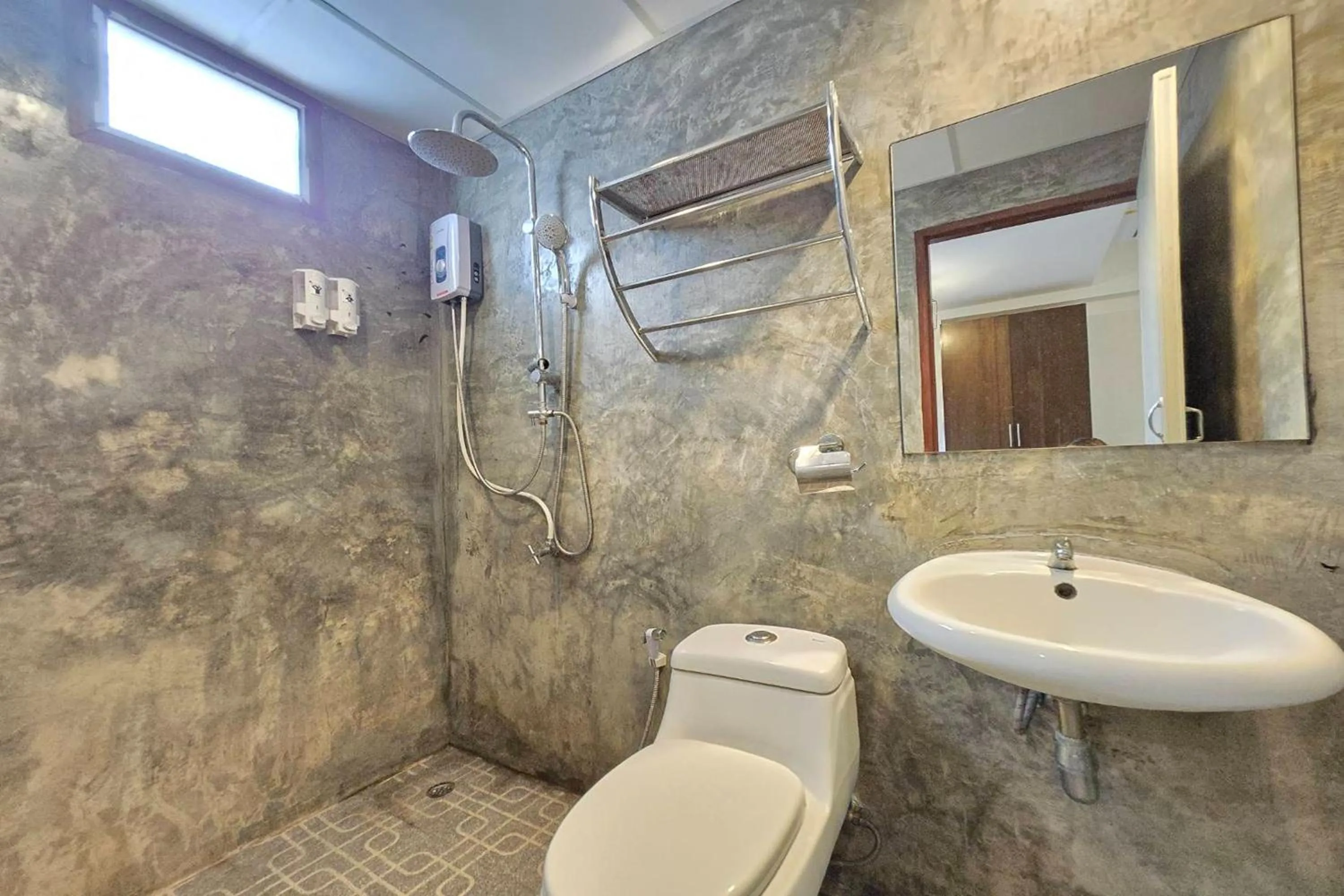 Shower in Hotel Wualai by CMStay