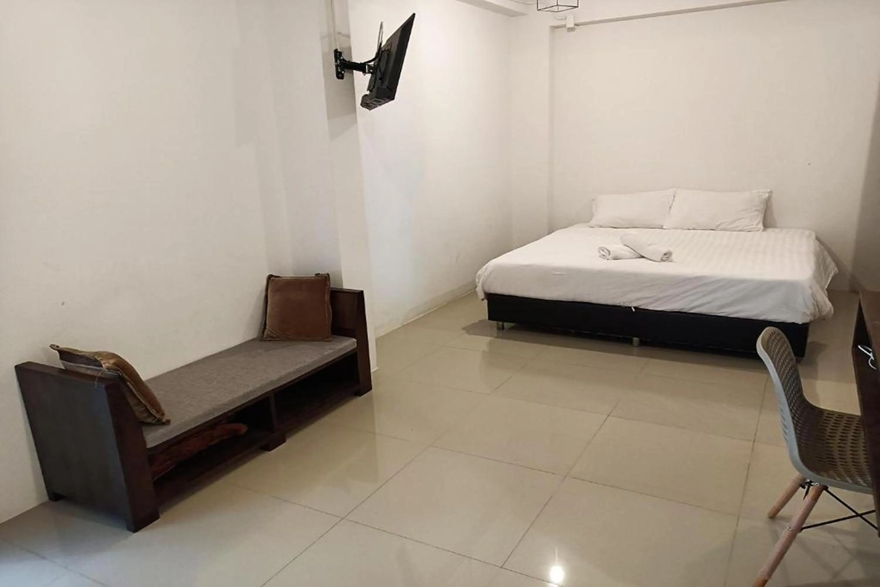 Bed in Hotel Wualai by CMStay