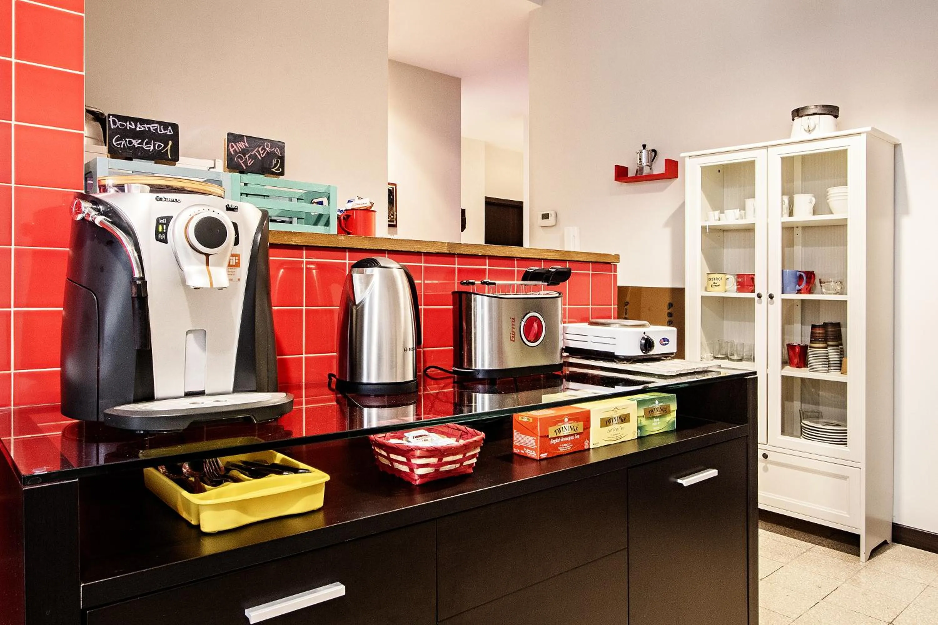 Communal kitchen in Old Kitchen Vatican Suites