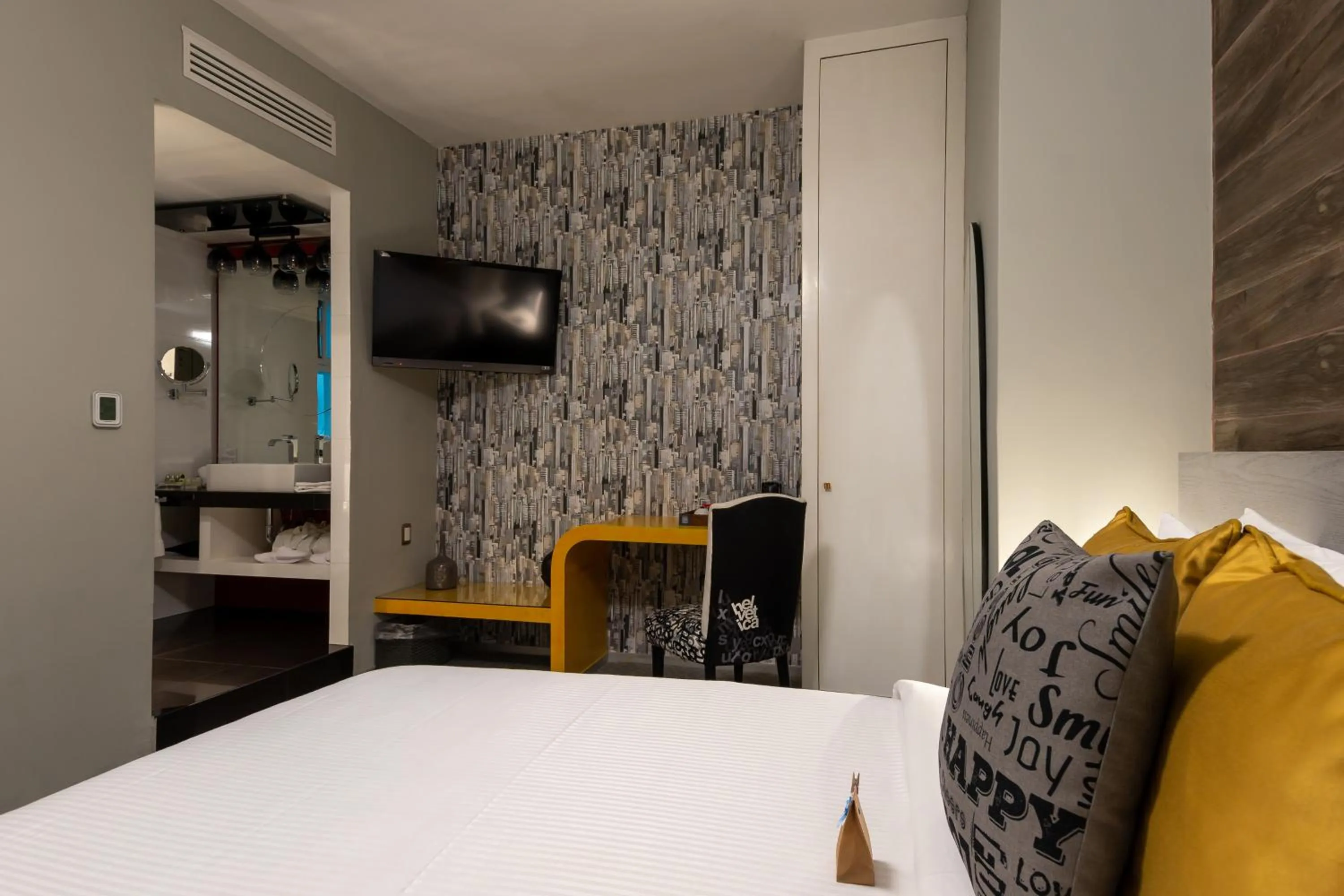 Bed in 1850 Hotel Boutique