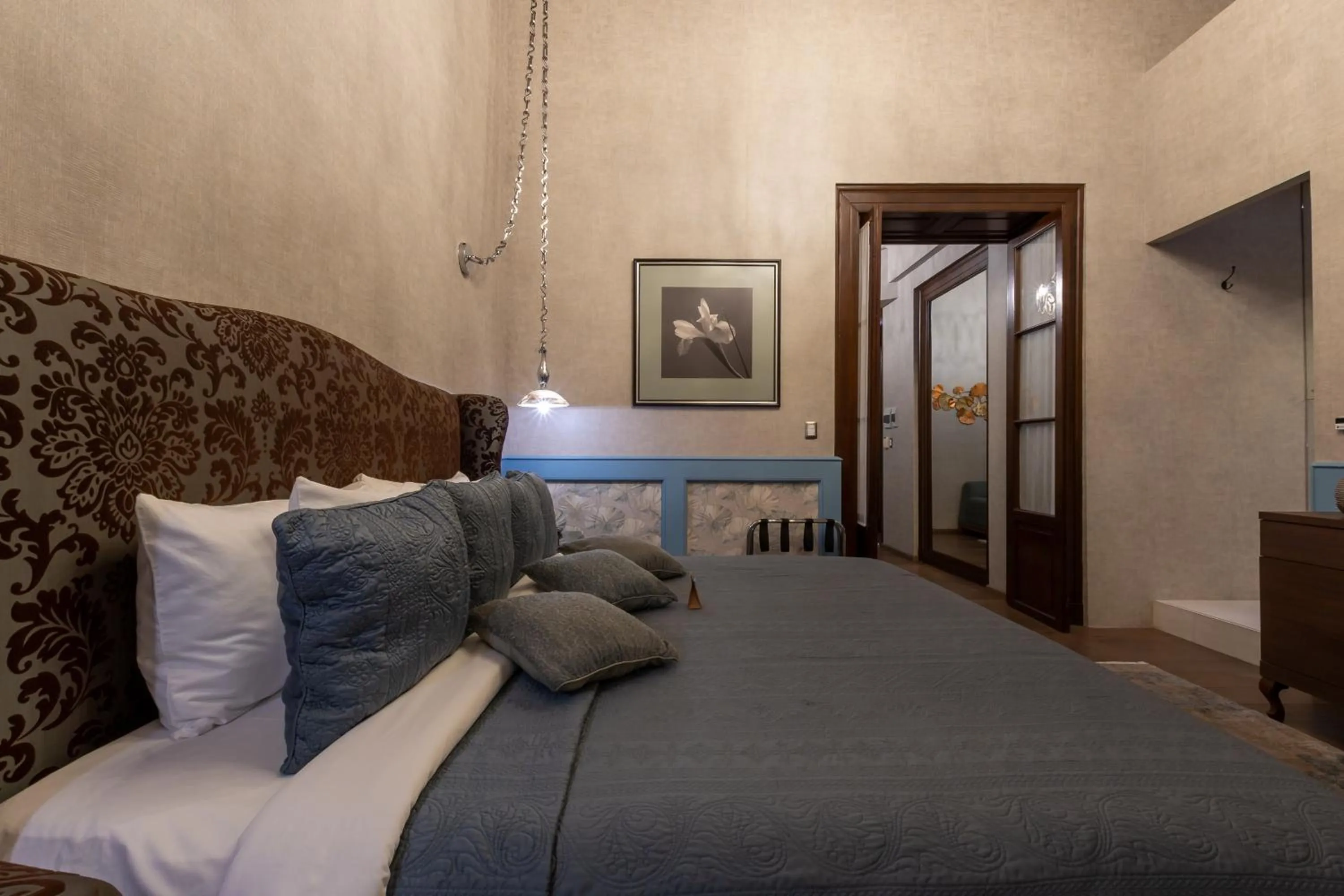 Bed in 1850 Hotel Boutique