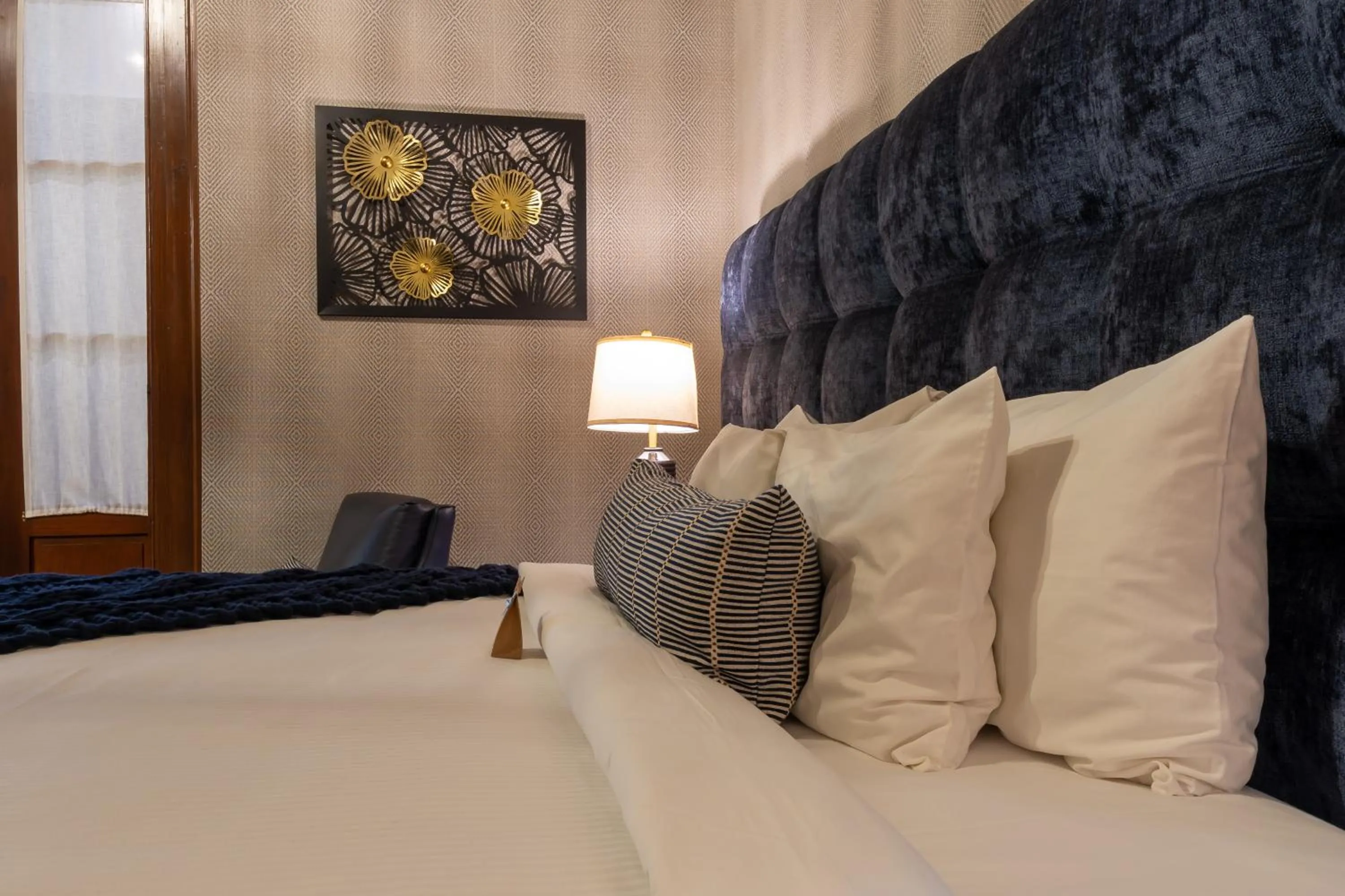 Bed in 1850 Hotel Boutique