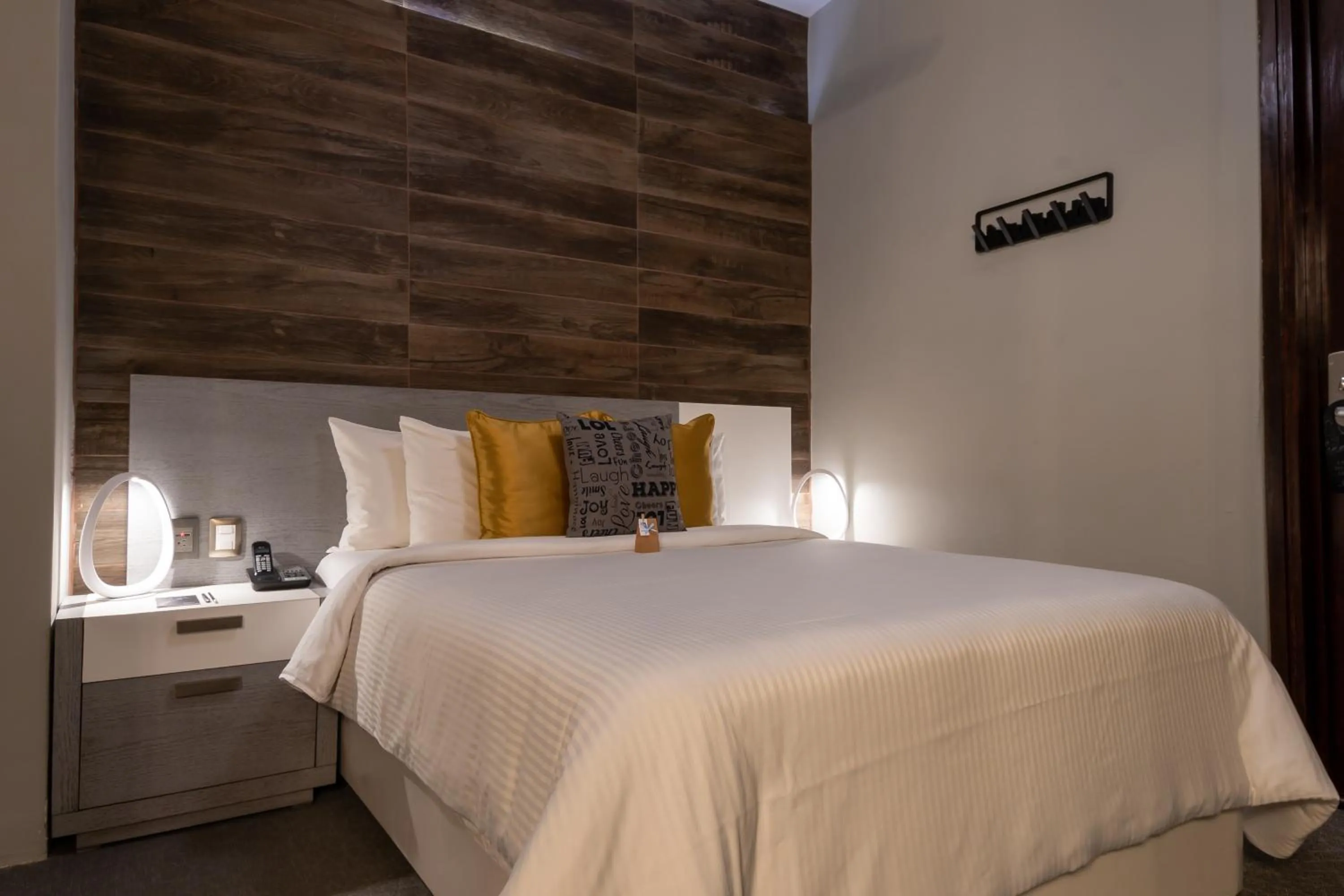 Bed in 1850 Hotel Boutique