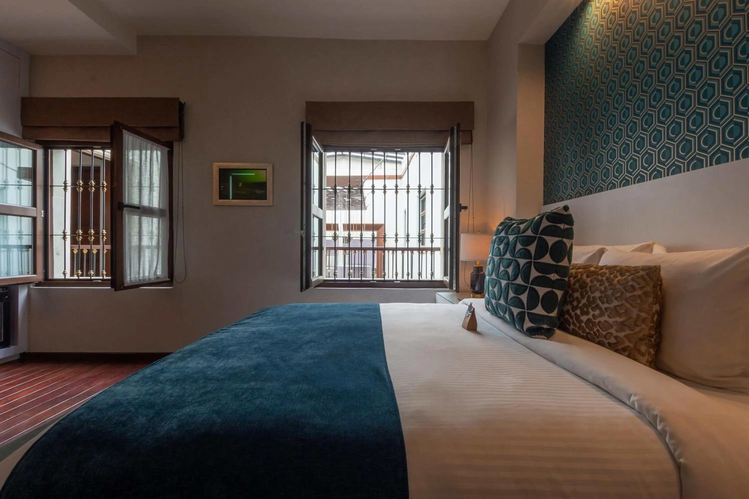 Bed in 1850 Hotel Boutique