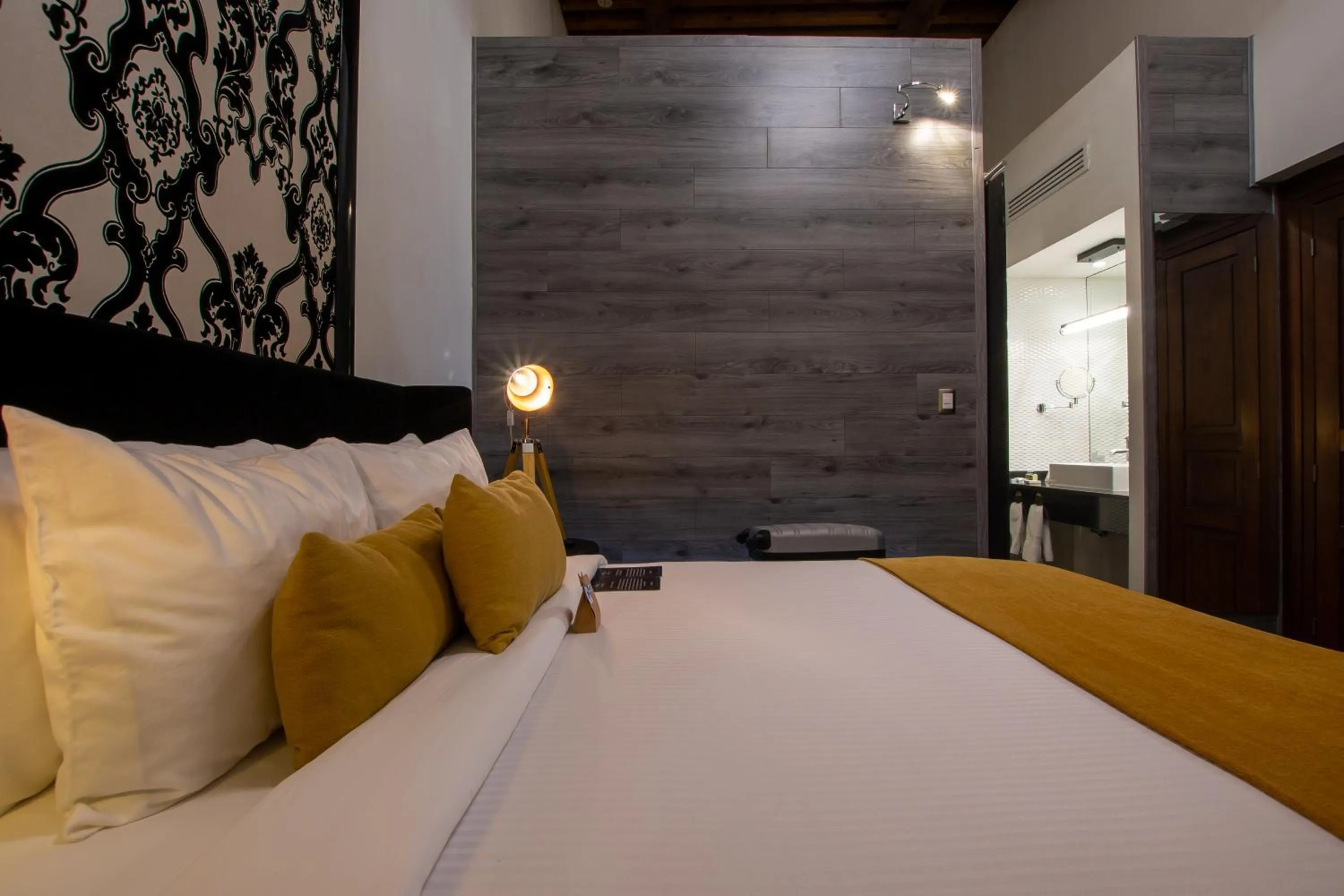 Bed in 1850 Hotel Boutique