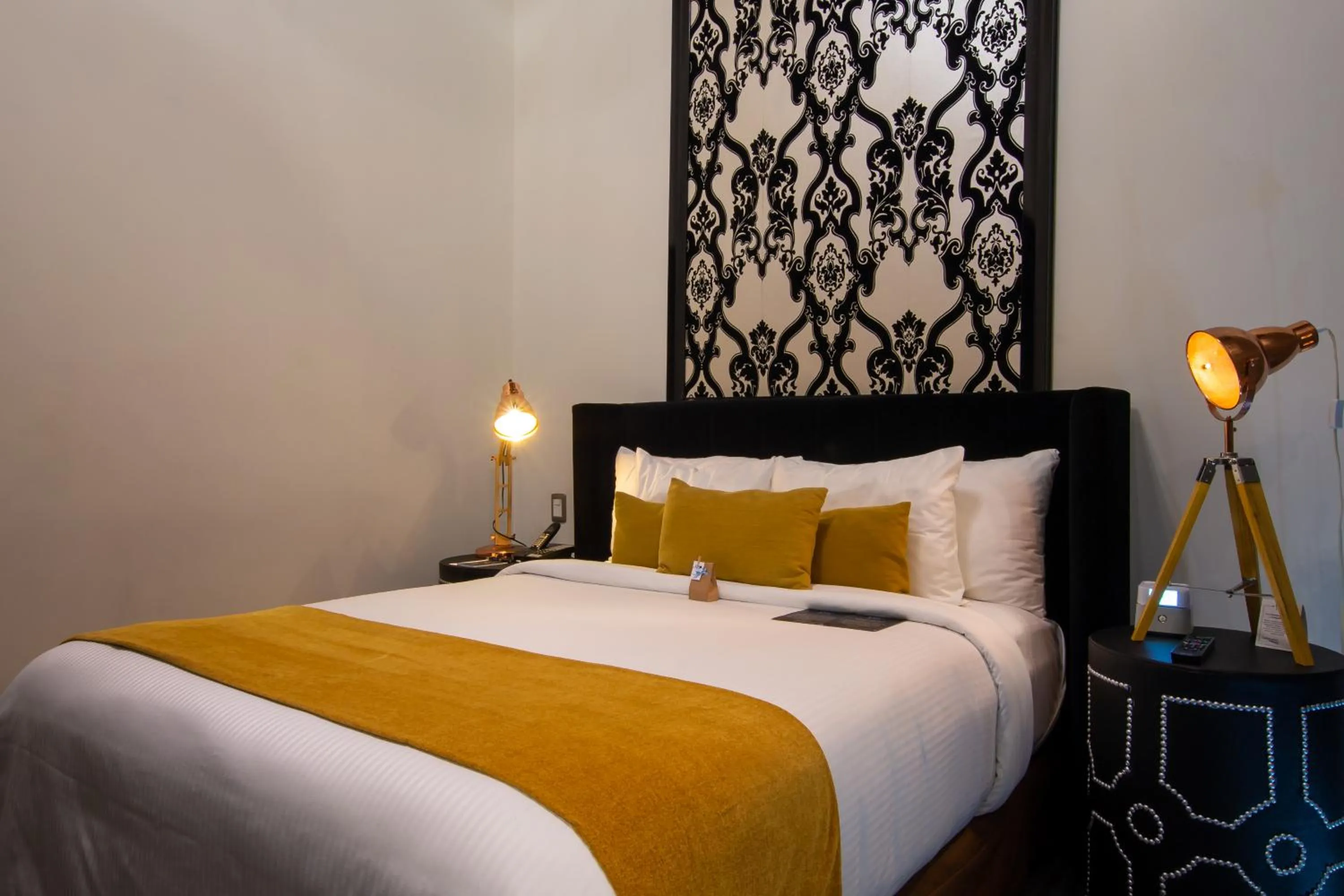 Bed in 1850 Hotel Boutique