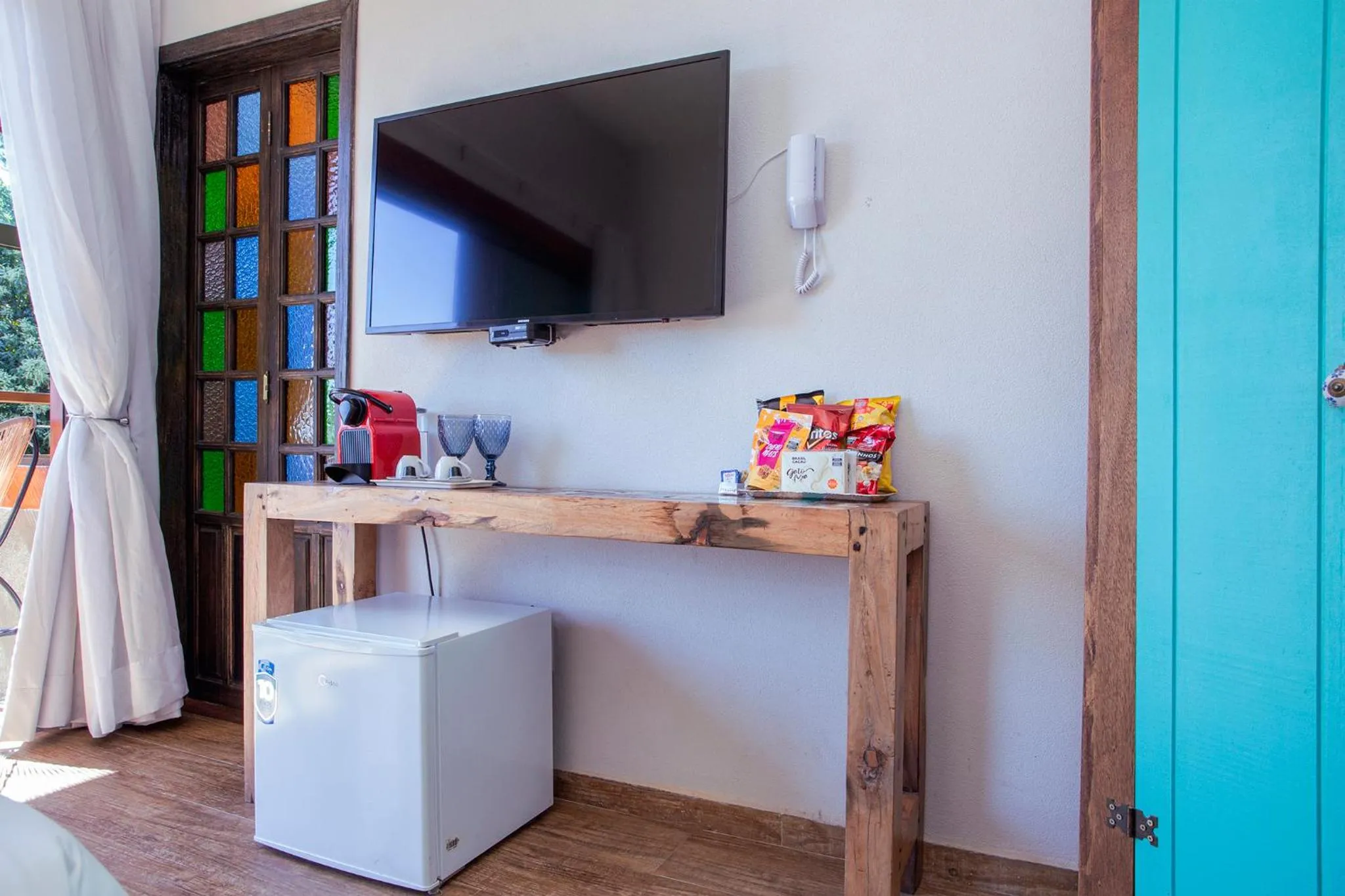 Communal lounge/ TV room in Hotel Vila Kebaya