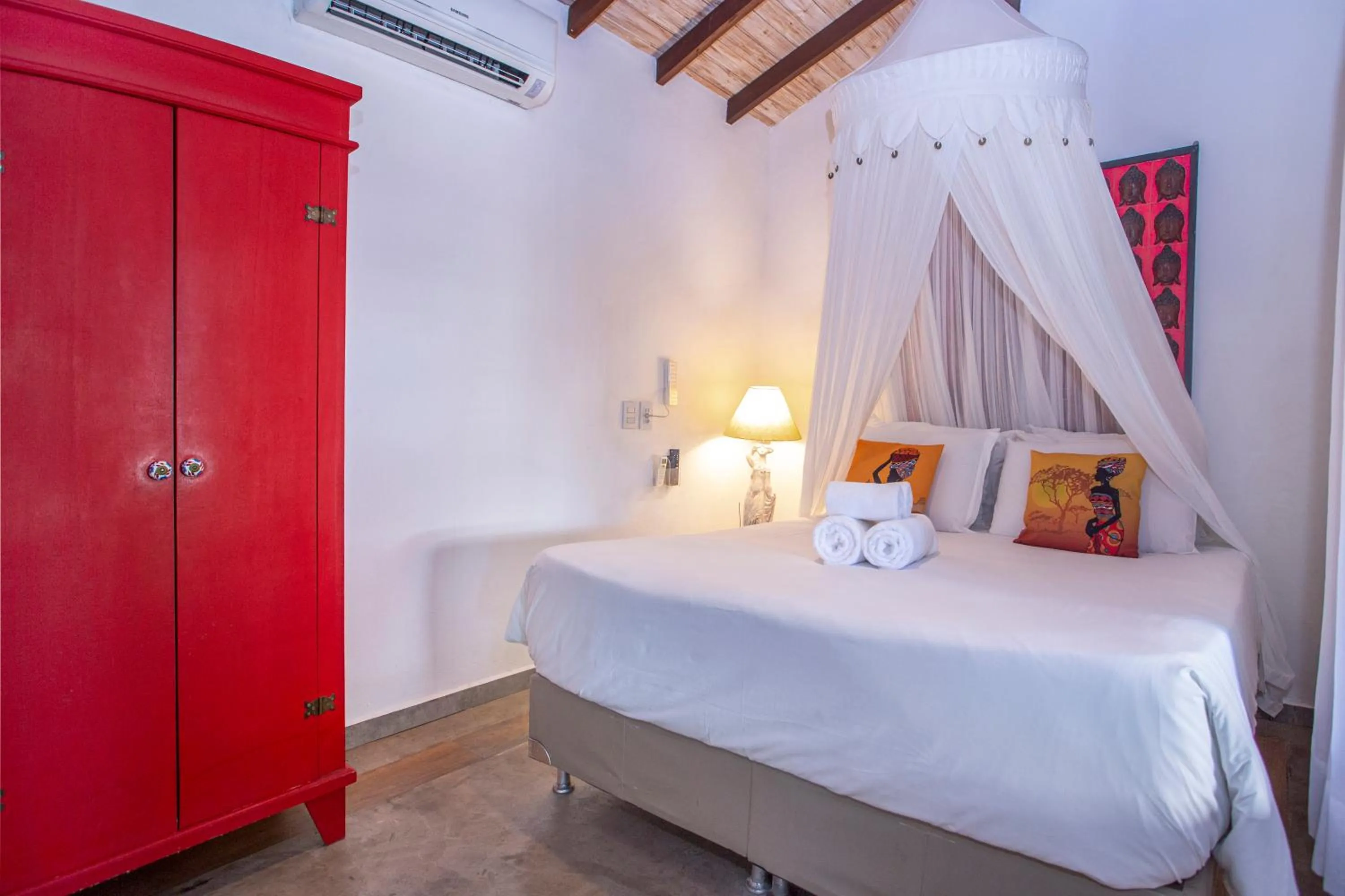 Bed in Hotel Vila Kebaya