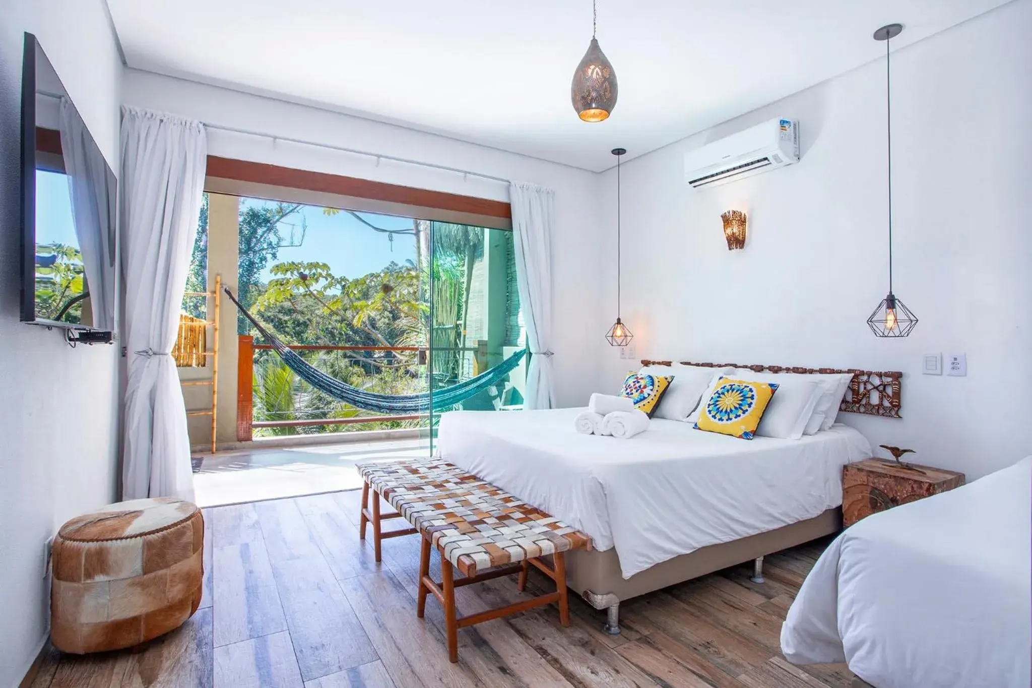 Luxo Triplo com Hidromassagem Externa in Hotel Vila Kebaya Luxo Triplo com Hidromassagem Externa in Hotel Vila Kebaya