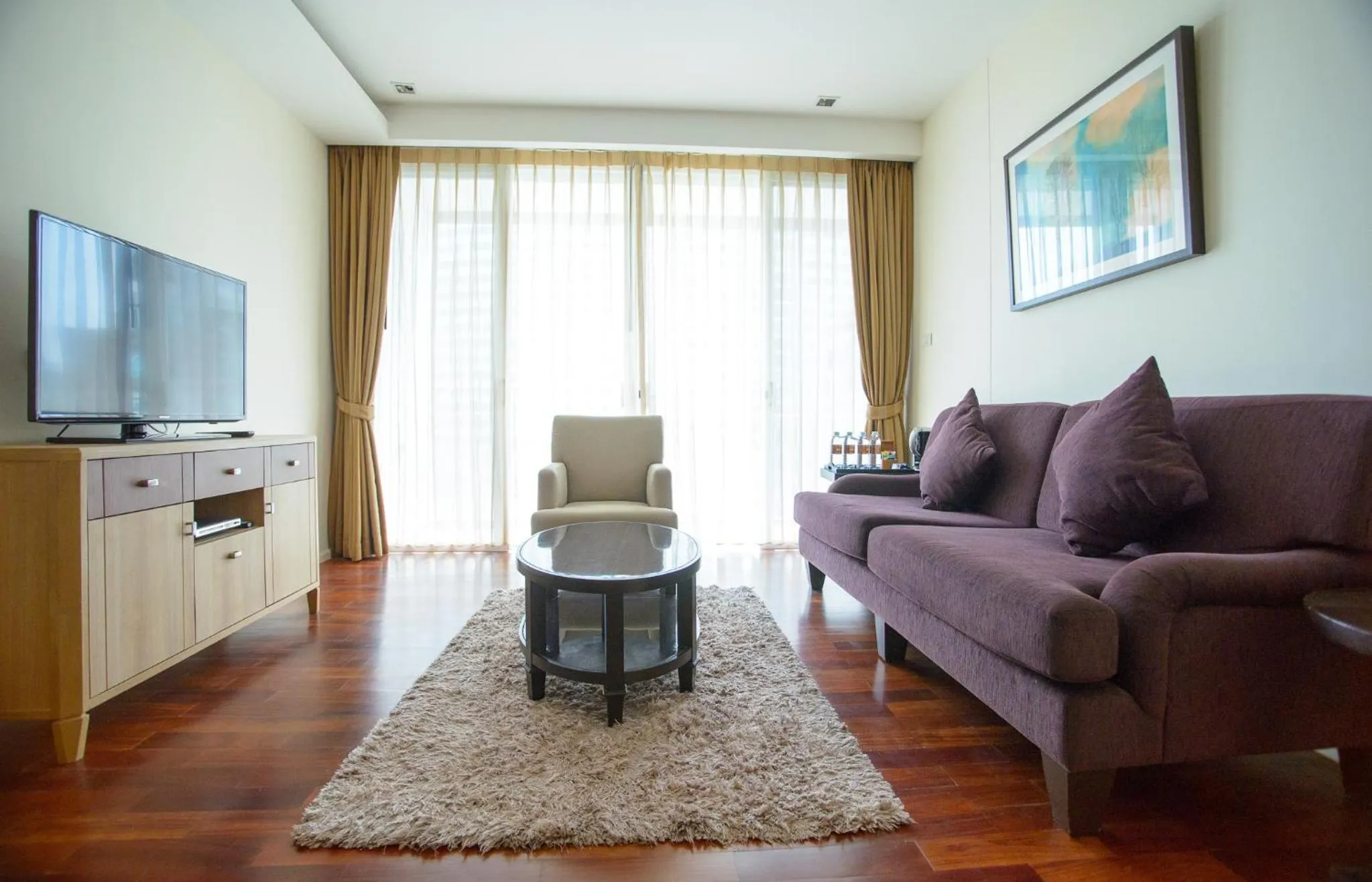 Communal lounge/ TV room in GM Serviced Apartment