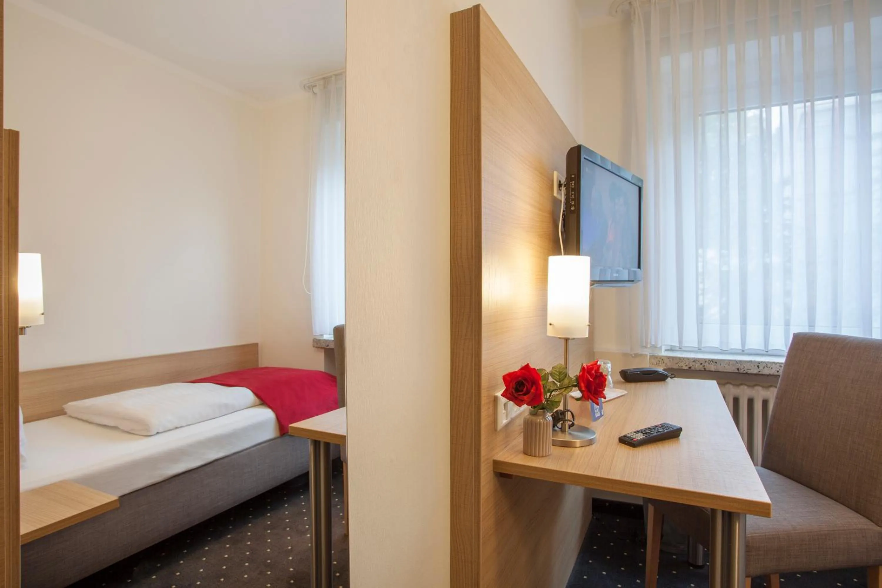 Bed in Hotel Celina Niederrheinischer Hof